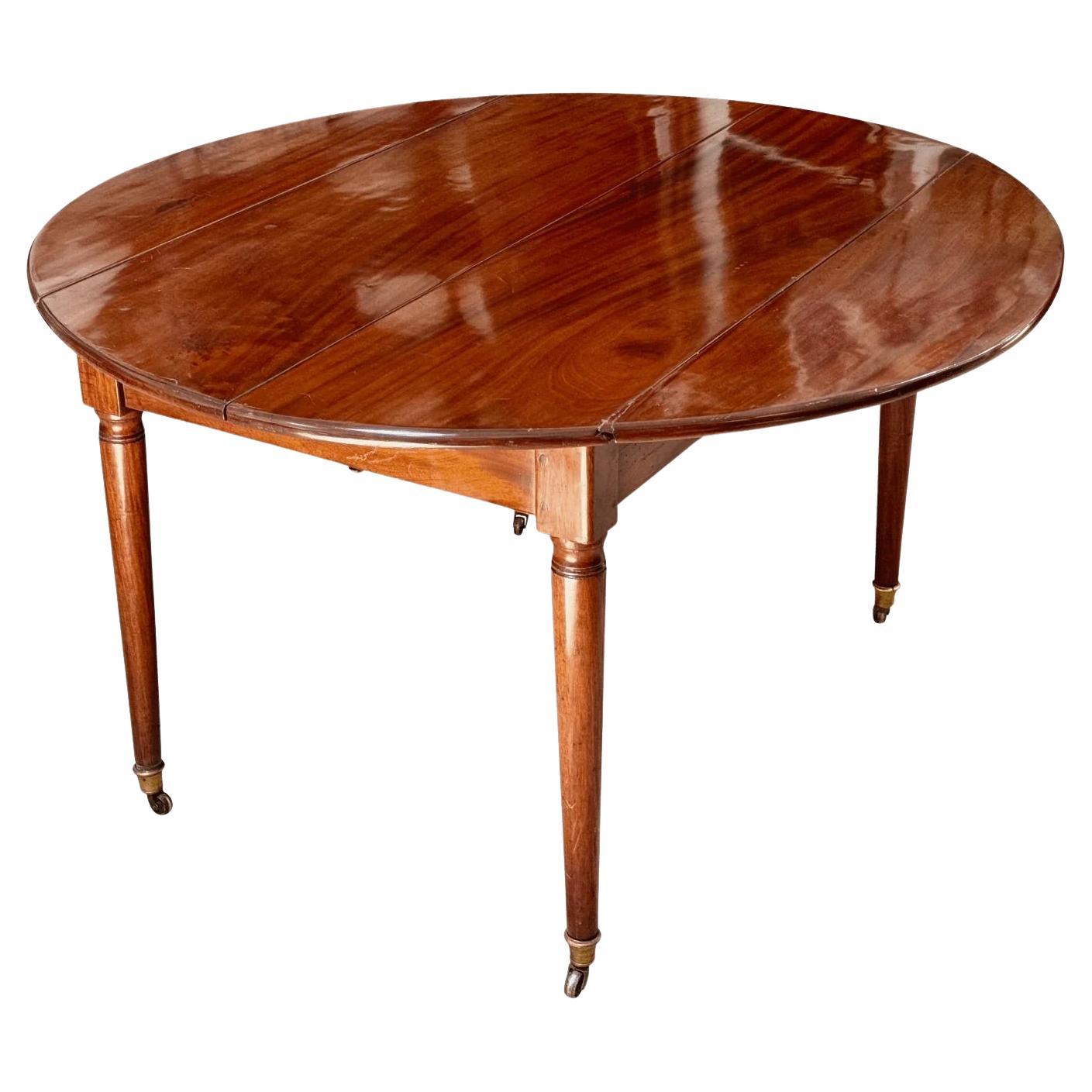 Table de salle à manger en acajou de style directoire français avec une feuille, c. 1800 en vente