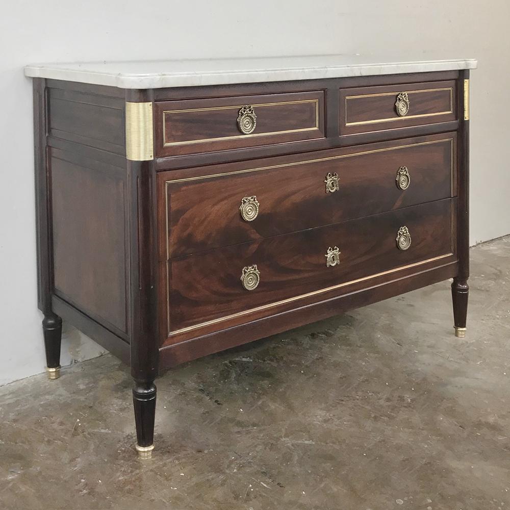 French Directoire mahogany marble-top commode, silver chest combines the tailored architecture of antiquity with the sheer natural beauty of exotic imported mahogany and purity of Carrara marble for a look that is beyond compare! Solid mahogany