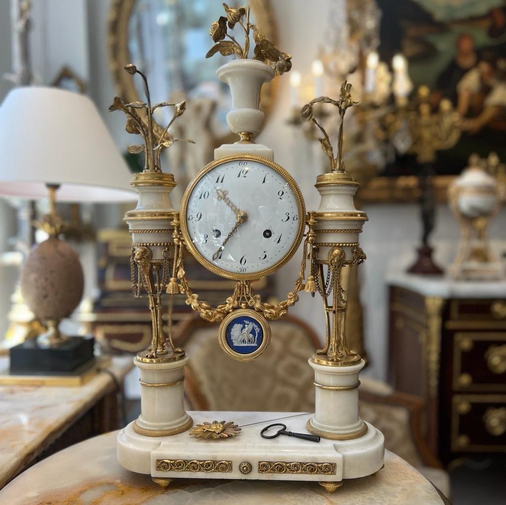 French Directoire Marble Athenian Clock with Eagle Heads Early 19th century 1