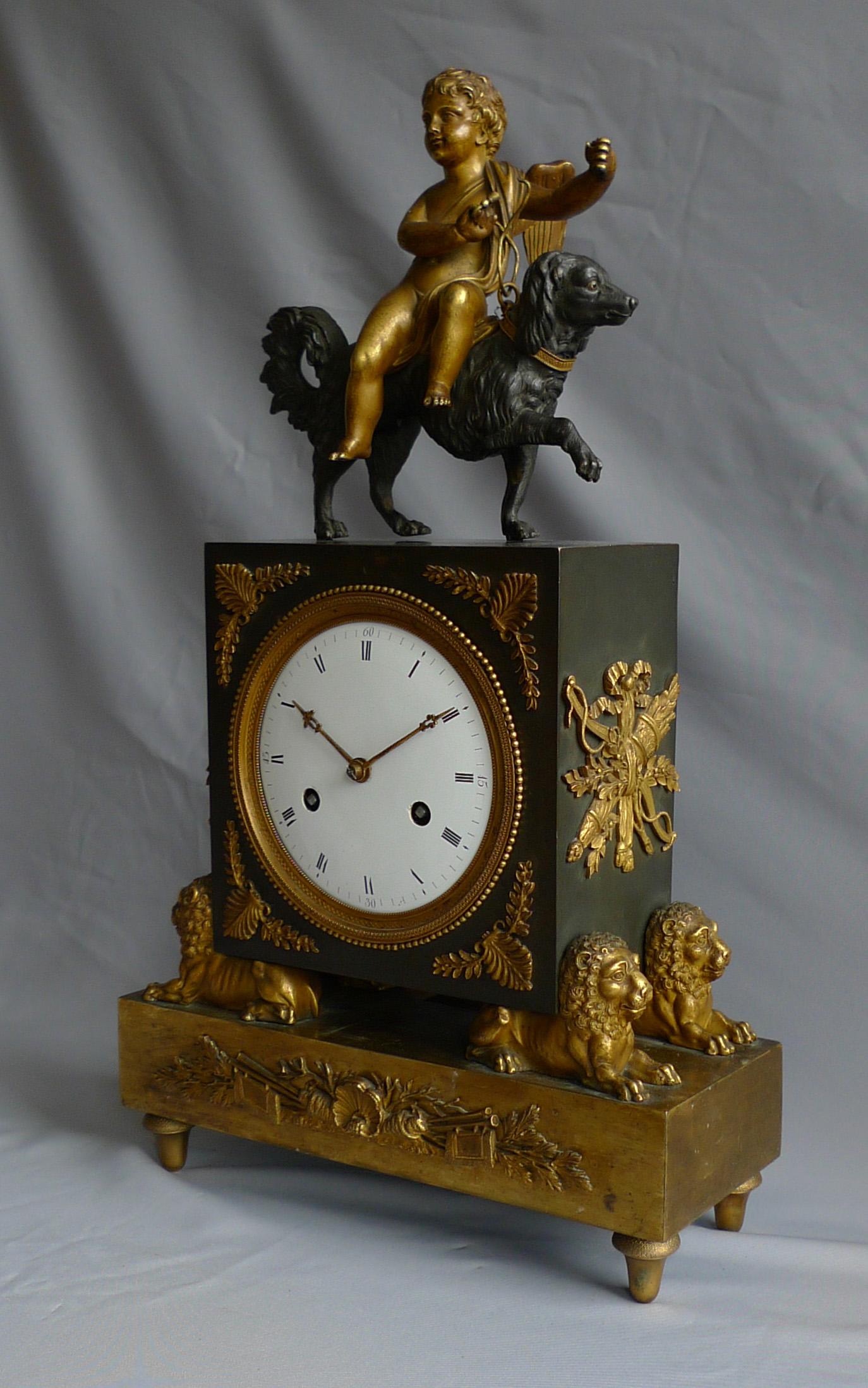 Patinated French Directoire or Empire Clock with Cupid Riding a Dog For Sale