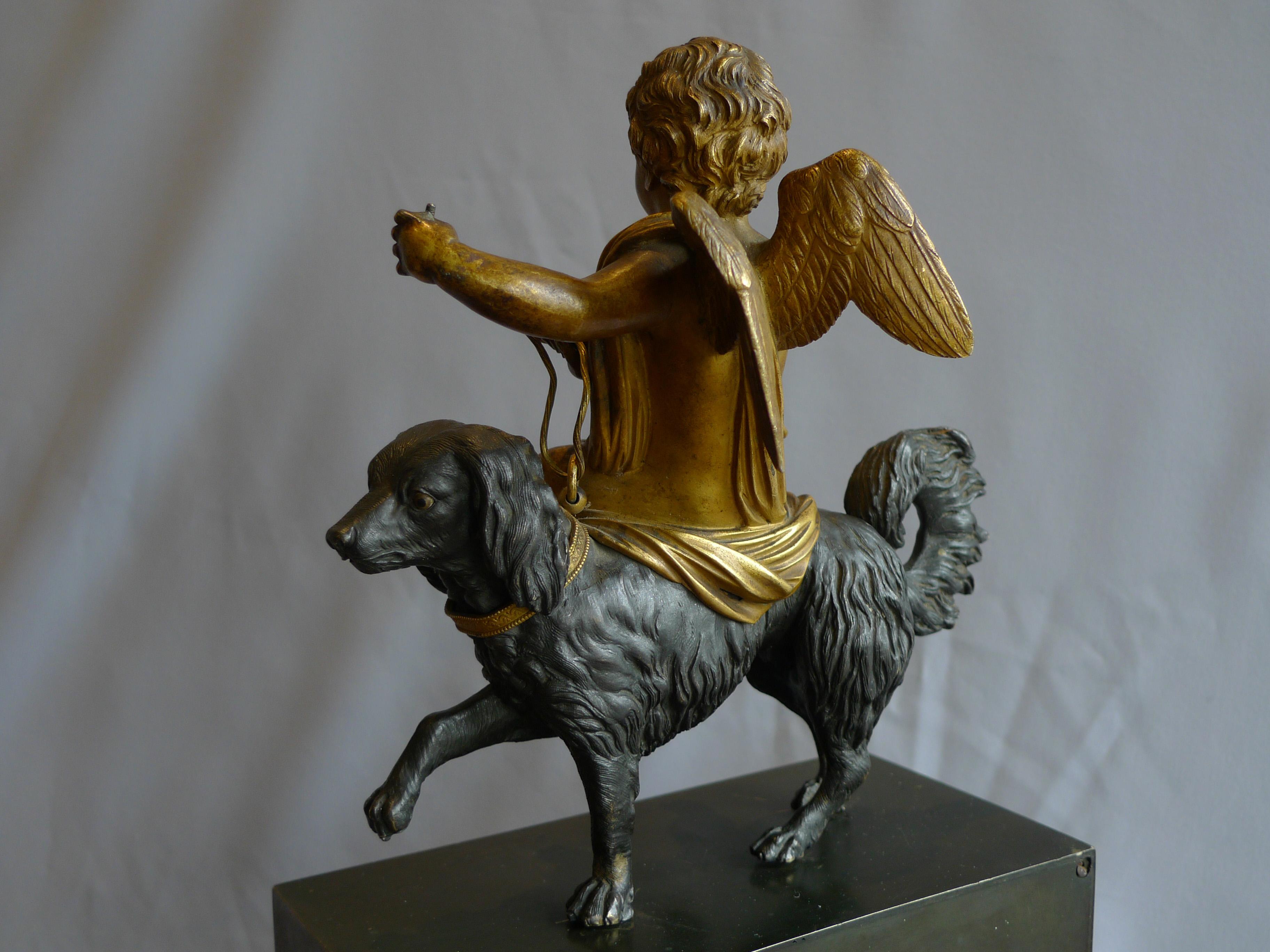 Bronze French Directoire or Empire Clock with Cupid Riding a Dog For Sale