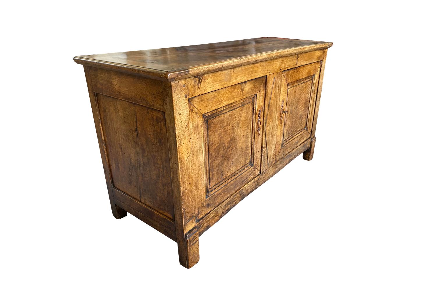A very handsome French Directoire 2 door buffet constructed from beautiful walnut. A wonderful storage piece for a traditional surrounding. Stunning patina, warm and luminous.