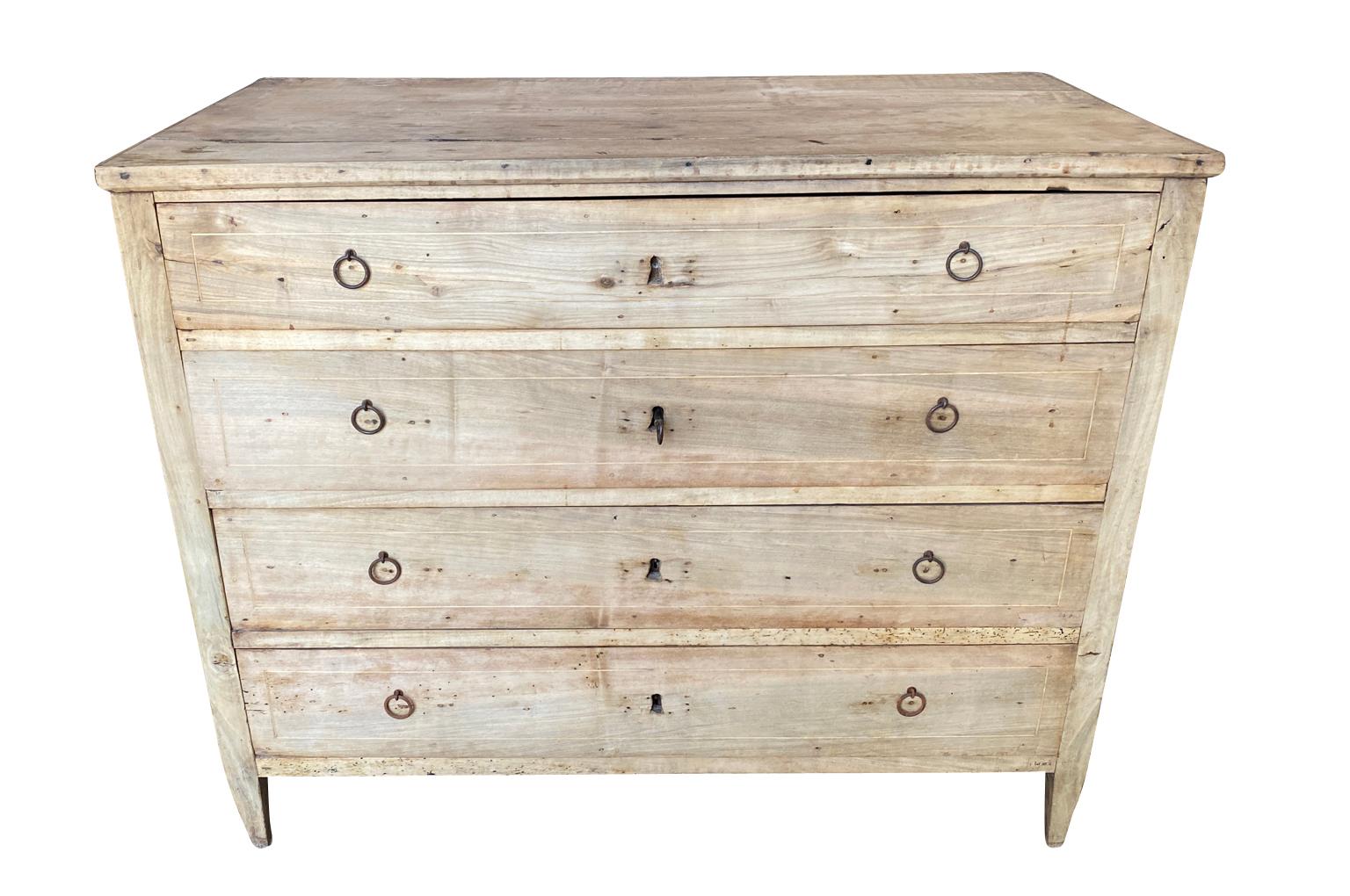 A very handsome early 19th century Directoire period commode from the Provence region of France. Soundly constructed from beautiful walnut with drawers resting on tapered legs.