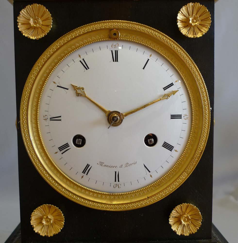 Early 19th Century French Directoire Period Ormolu and Patinated Bronze Mantel Clock Signed Maniere For Sale