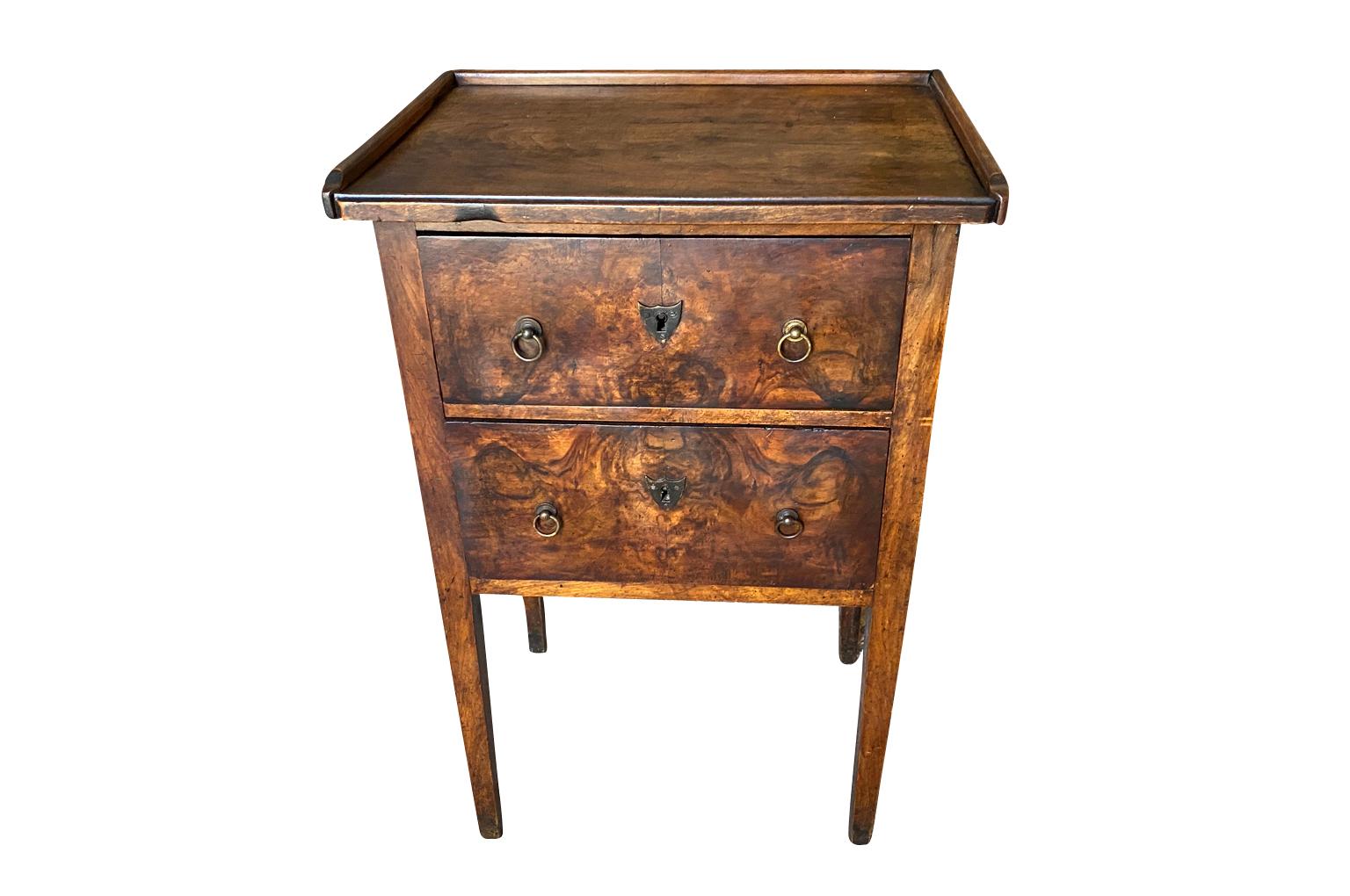 A very beautiful early 19th century Directoire period Side Table from the South of France. Wonderfully constructed from handsome walnut with 2 drawers raised on tapered legs. Gorgeous graining and patina.