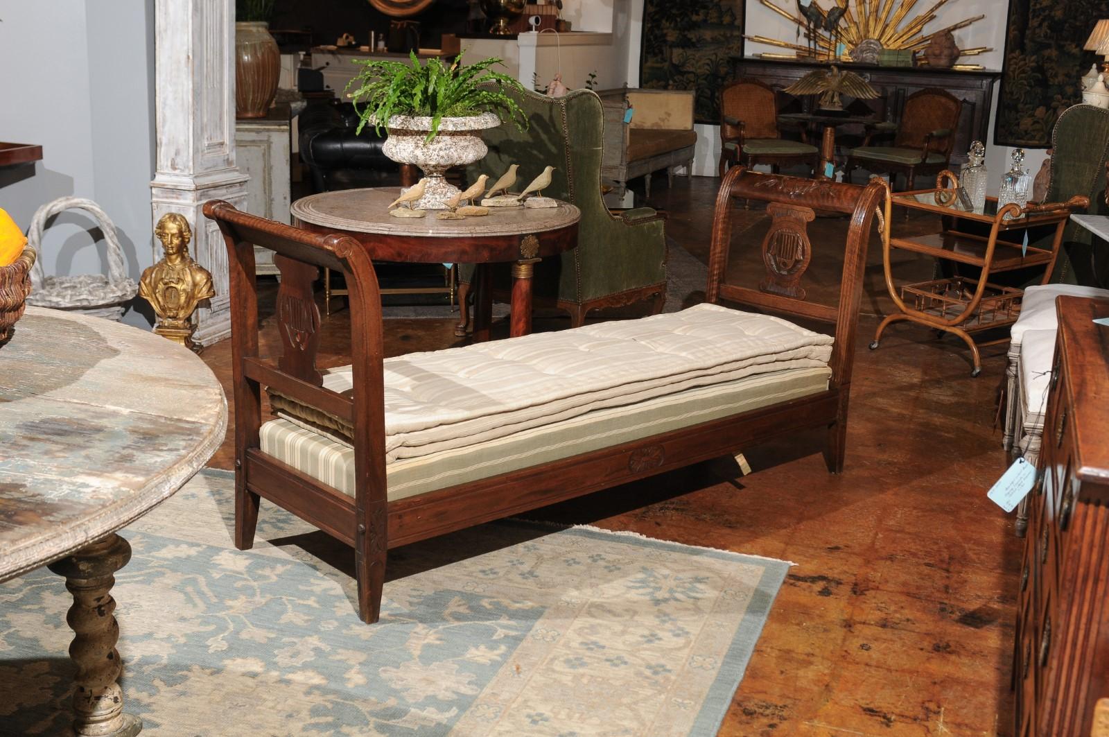 Hand-Carved French Directoire Style 19th Century Walnut Daybed with Carved Lyre and Urn