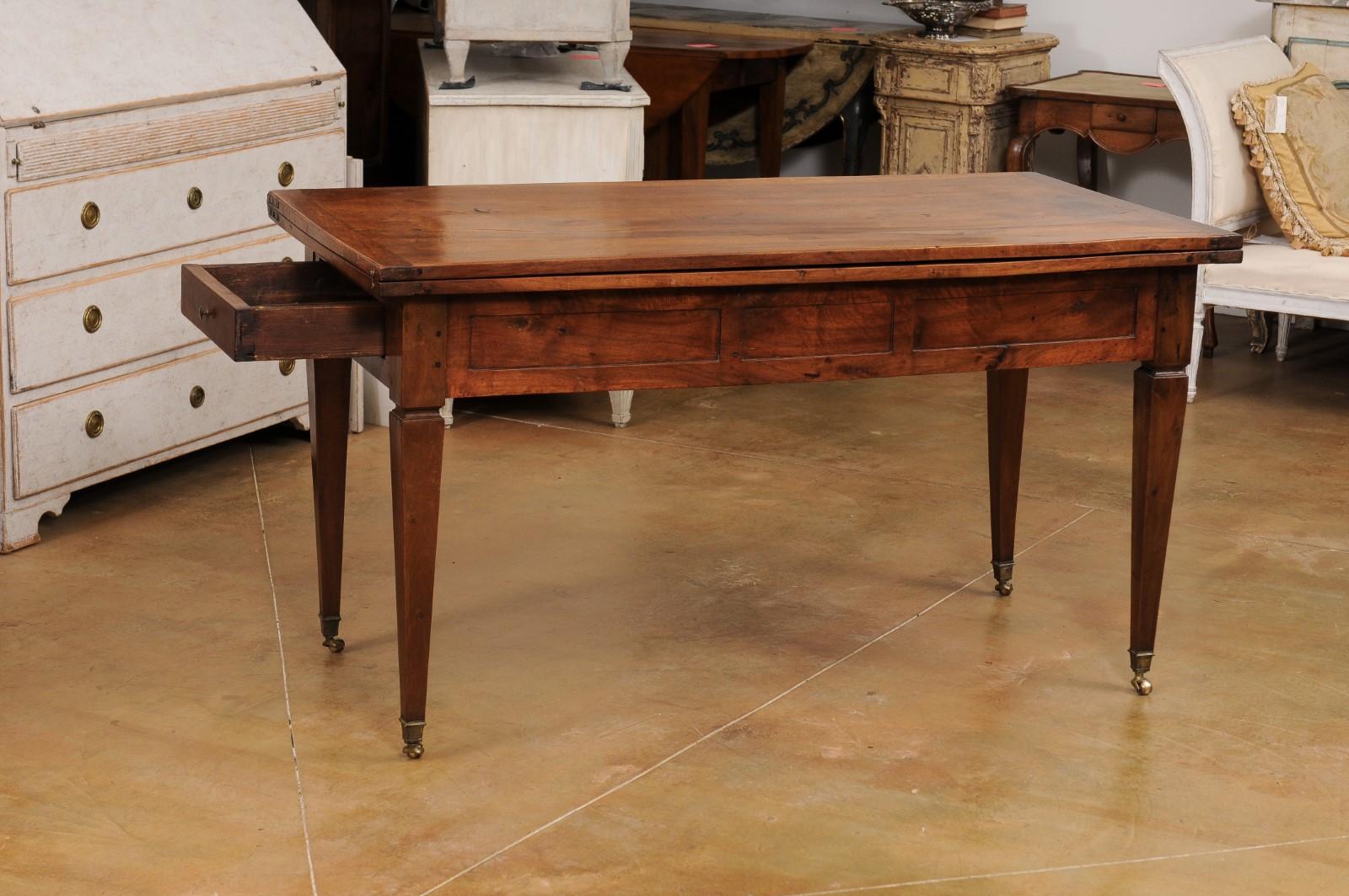 French Directoire Style 19th Century Walnut Table with Folding Top, Tapered Legs In Good Condition For Sale In Atlanta, GA