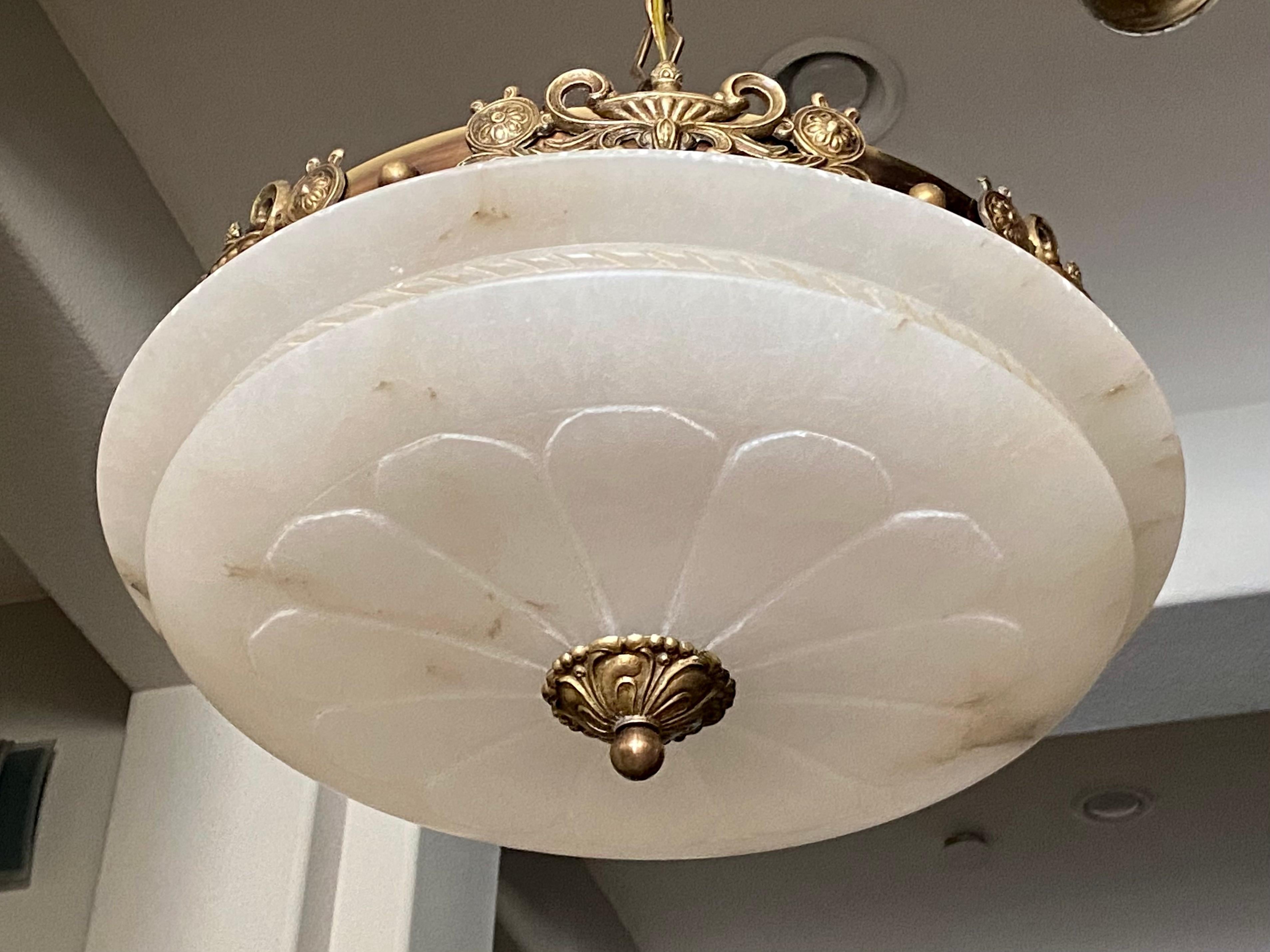 Alabaster pendant light or chandelier with aged patinated brass fittings in the Directoire style. Wired for US, fixture uses three candelabra or 
