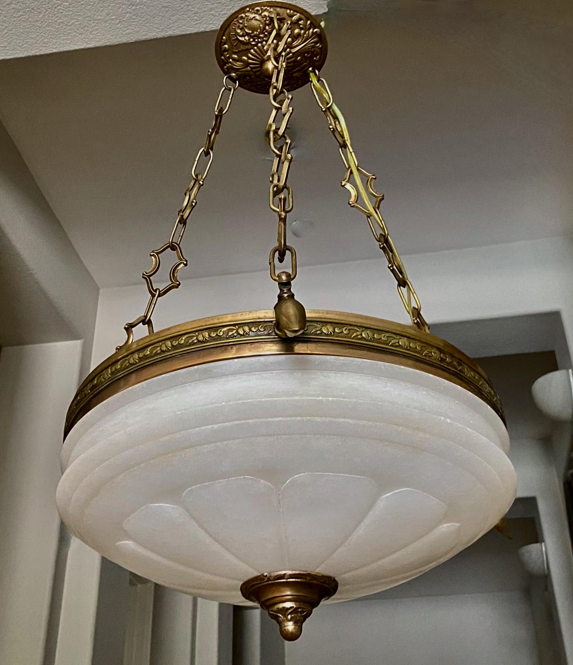Carved alabaster pendant light or chandelier with aged patinated brass fittings in the Directoire style. Wired for US, fixture uses three candelabra or 
