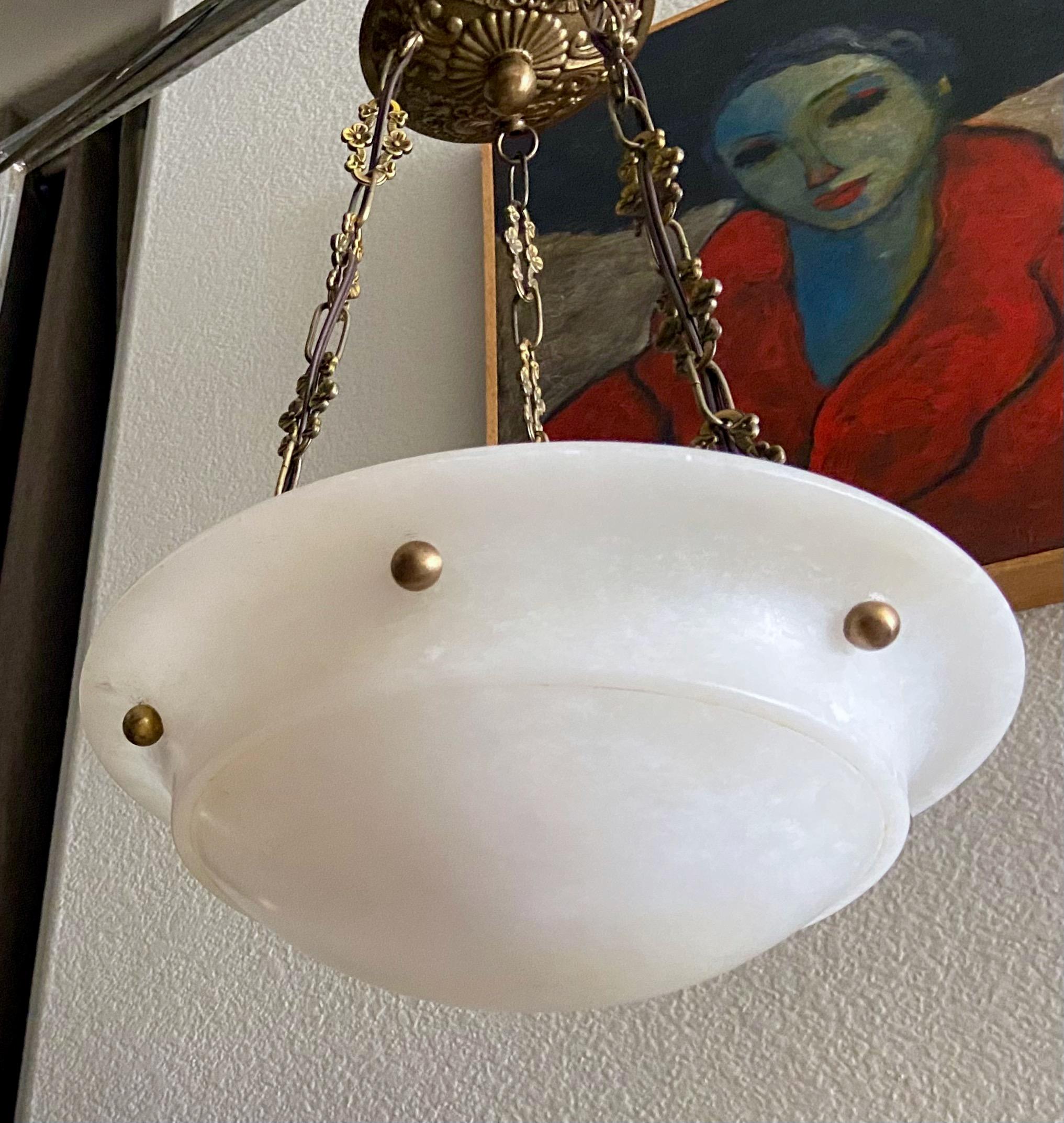 Alabaster pendant or chandelier light with aged patinated brass fittings in the Directoire style. Smaller scale fixture perfect for hall or a powder room. Newly wired for US, fixture uses two candelabra 