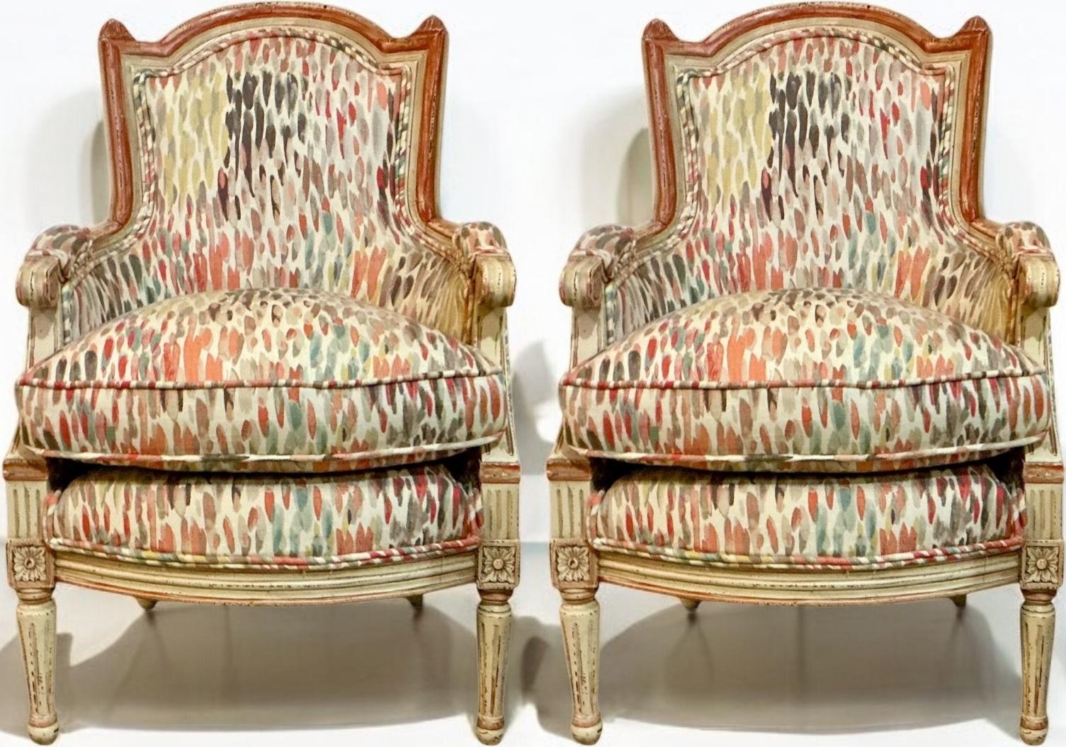 This is a set of French Directoire style children’s bergere chairs. The hand painted frames are coral and ivory. The upholstery is new and a cotton linen blend. The frames show some wear to the frames. They most likely date to the middle of the 20th