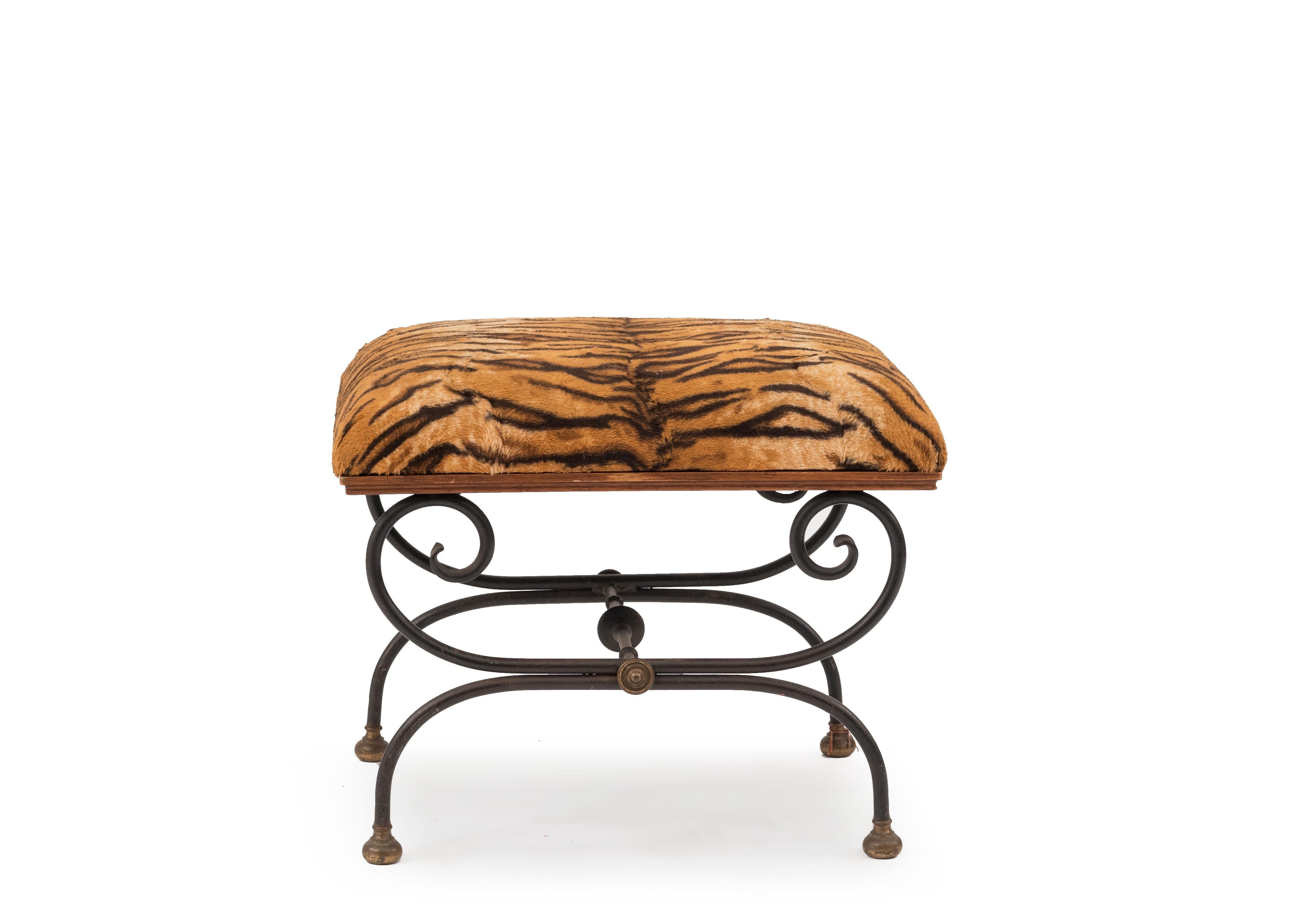 French Directoire style 19/20th Century) iron and brass cross leg bench with leopard upholstered seat.
