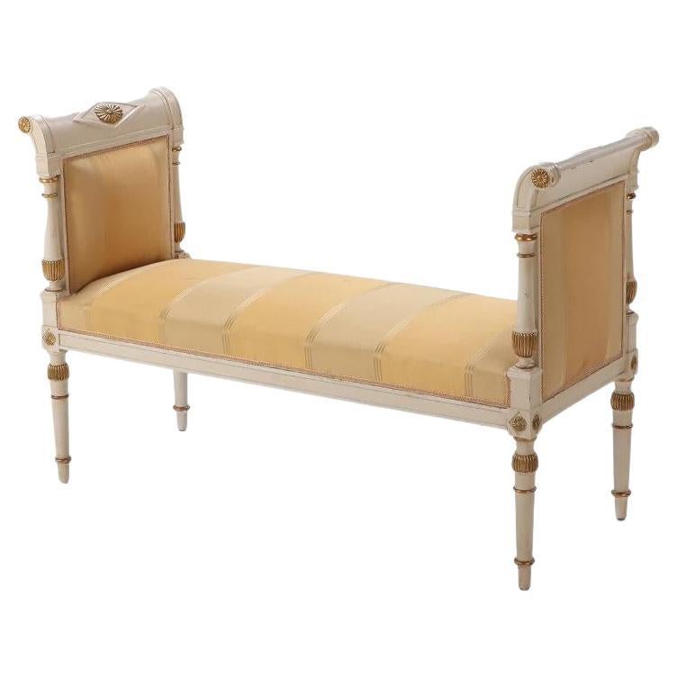 French Directoire style painted and gilt window bench circa 1950.  For Sale