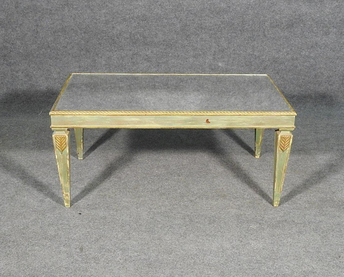 Beautiful antique distressed mirrored top and great color of paint with gilded antique decoration. Mirrored top. Paint decorated. Gilded accents. Measures: 17 3/8