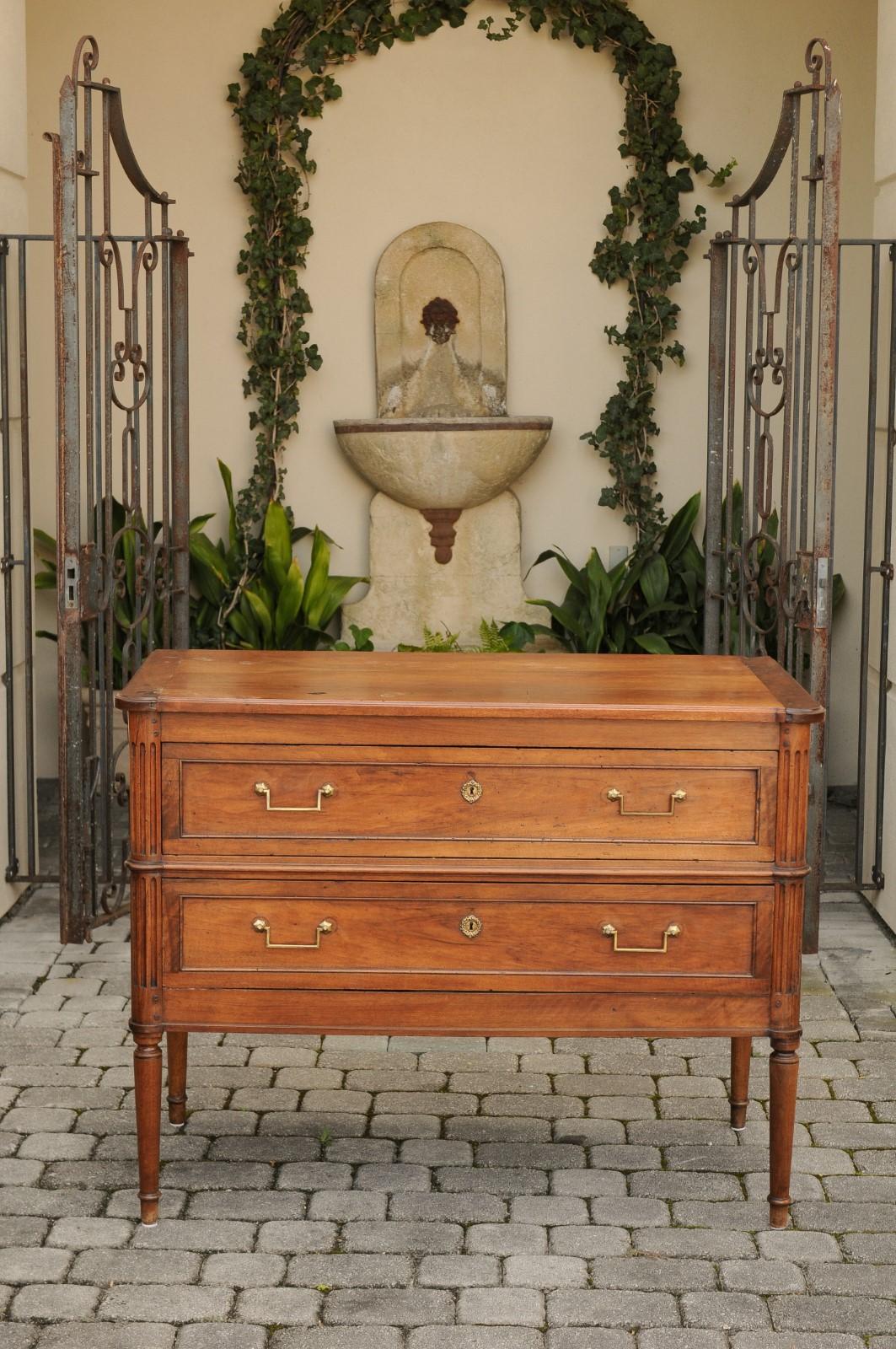 Veneer French Directoire Style Walnut Two-Drawer Commode, circa 1840 with Turned Legs