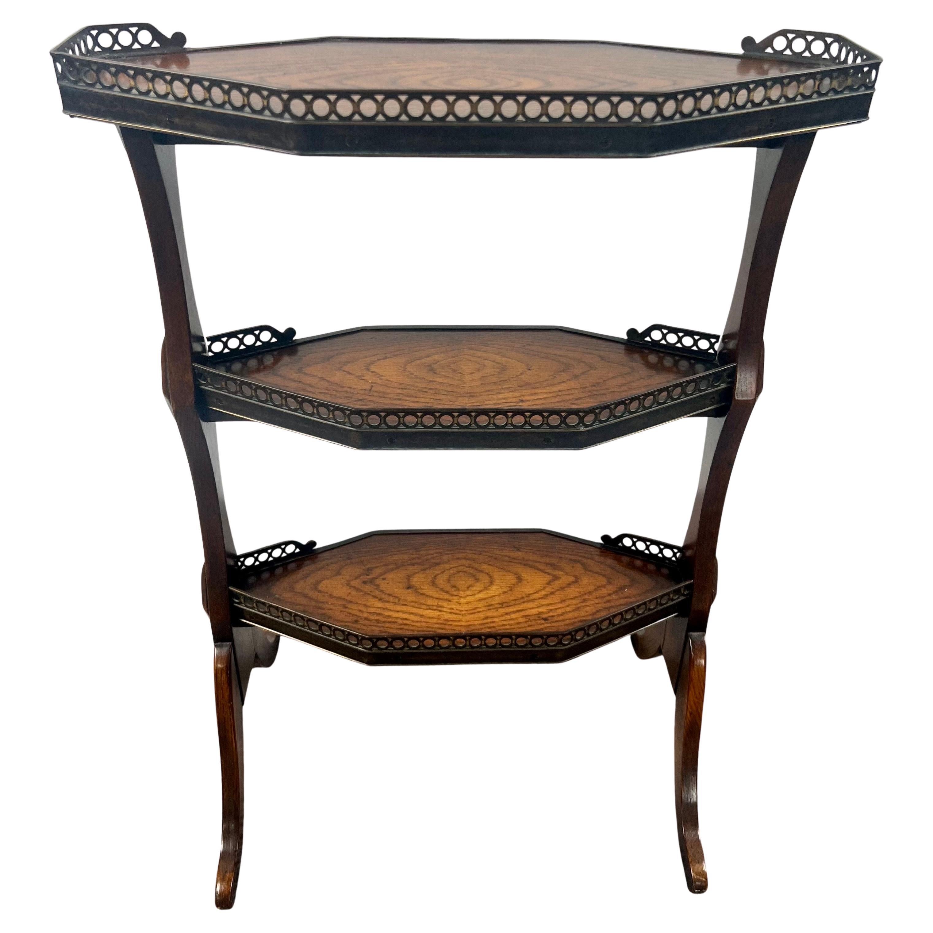 Three-Tier Oak Dessert Stand Side Table by Theodore Alexander: 

A finely crafted small three-tier étagère dessert stand or side table in the French Directoire style by Theodore Alexander. The piece is beautifully constructed in oak, showcasing the