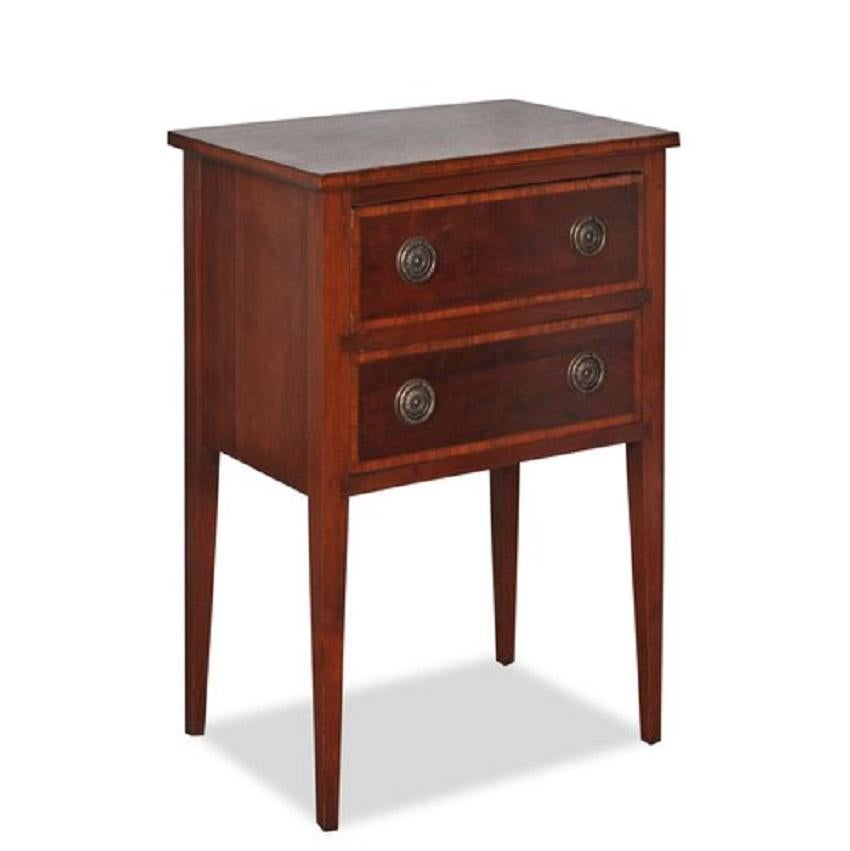 An antique pair of fruitwood nightstands having a figured case with two drawers fronted by inlaid panels centered by period pulls assumed to be original.

Likely French, 19th Century.

Provenance: A Park Avenue, NY residence.