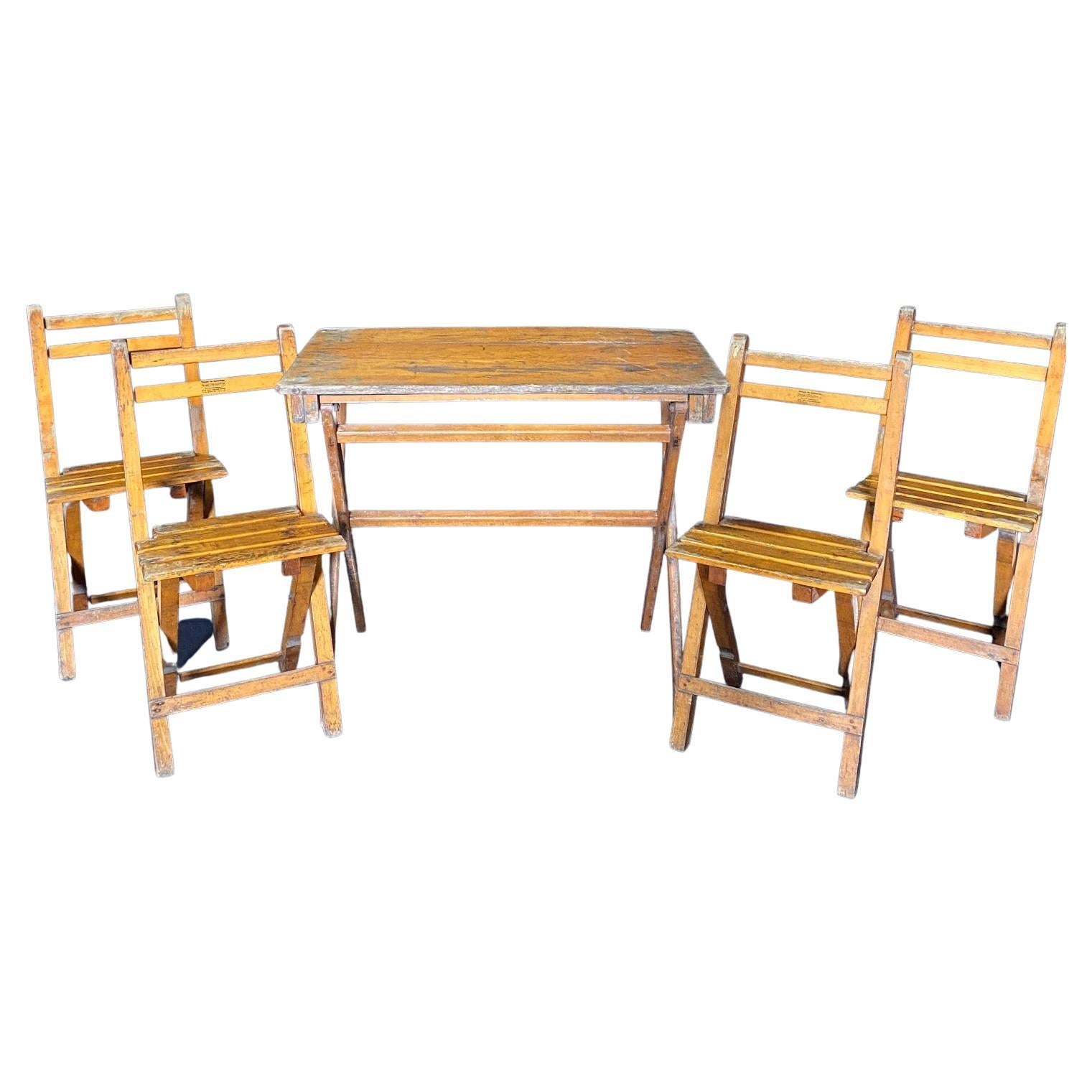 French Distressed Folding Bistro Cafe Set with Table and Four Chairs For Sale