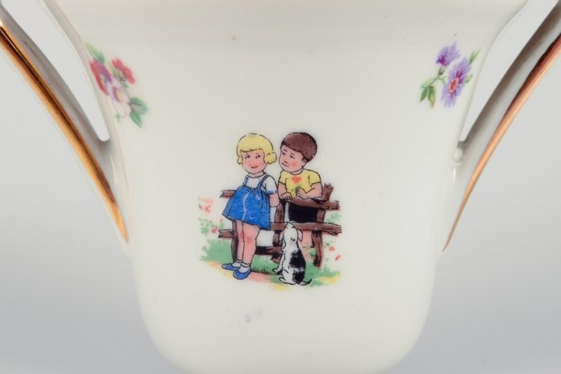 Porcelain French dolls dinnerware/childrens tea set in porcelain. For Sale
