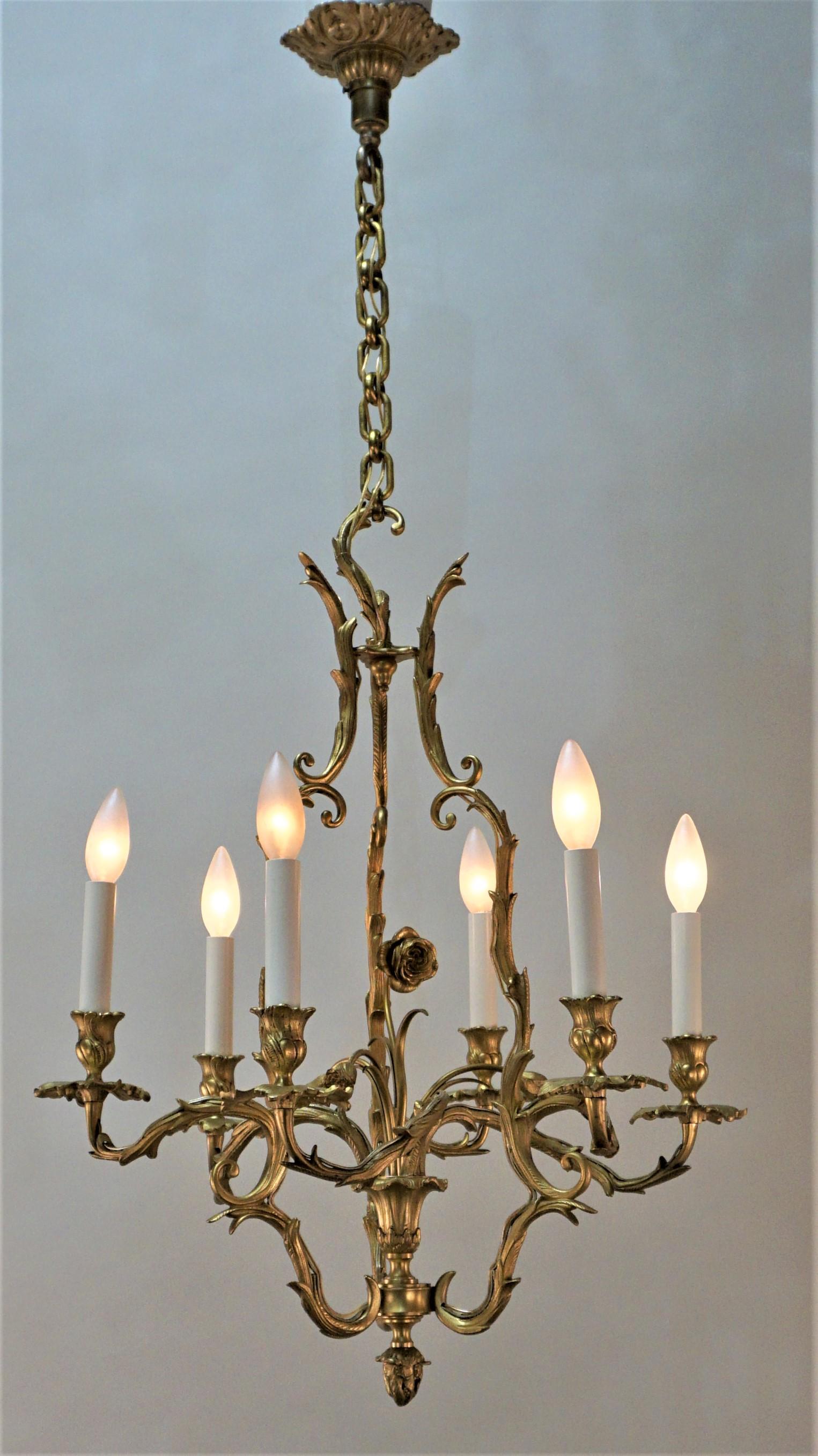 Elegant six-arm French doré bronze Art Nouveau chandelier
60 watts max each light.
Measures: Height fully installed 34