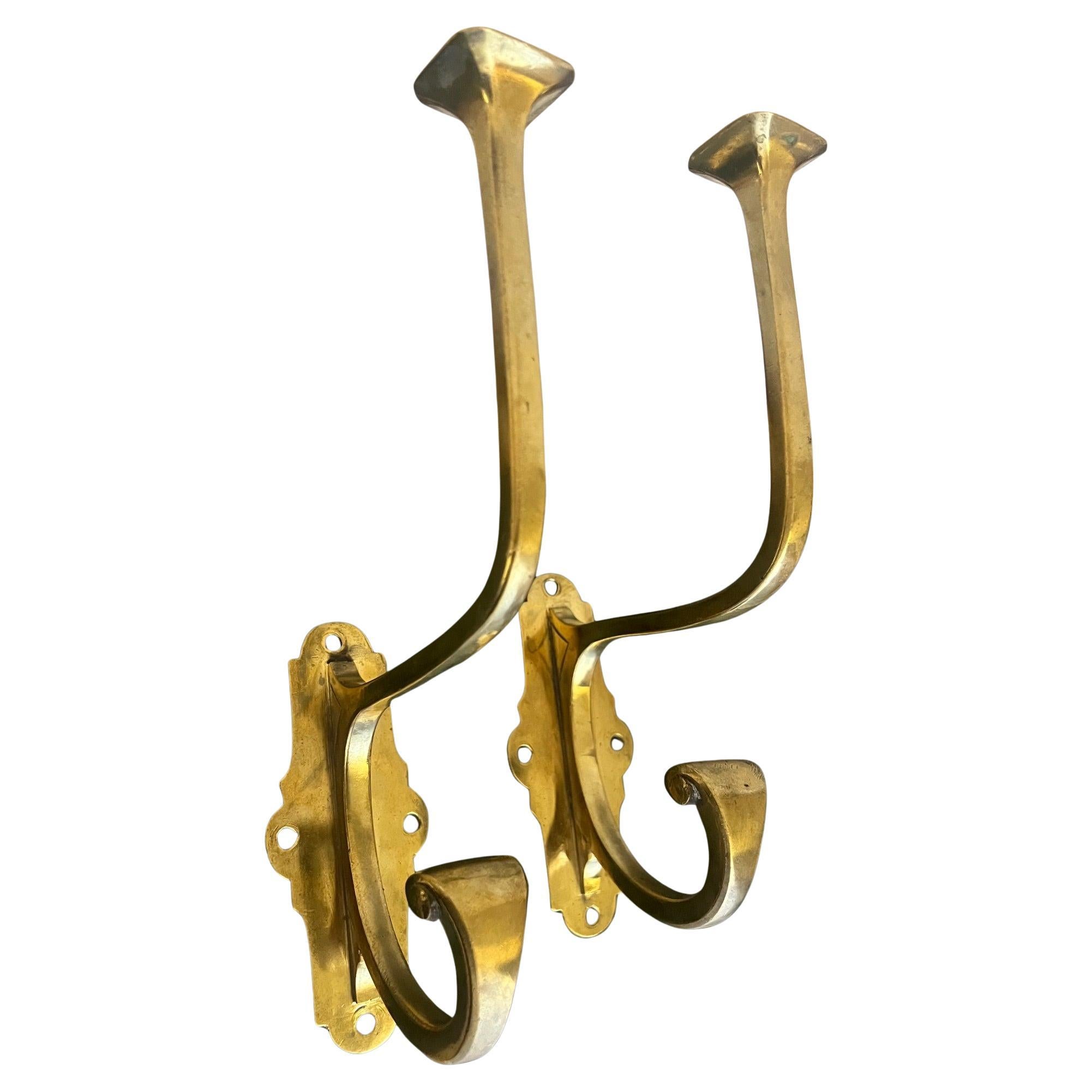 Doppi ganci francesi in ottone, anni '30 circa - set di 2