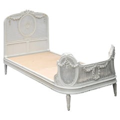 Antique French Double Caned & Carved White Twin Bed with Rose Swags
