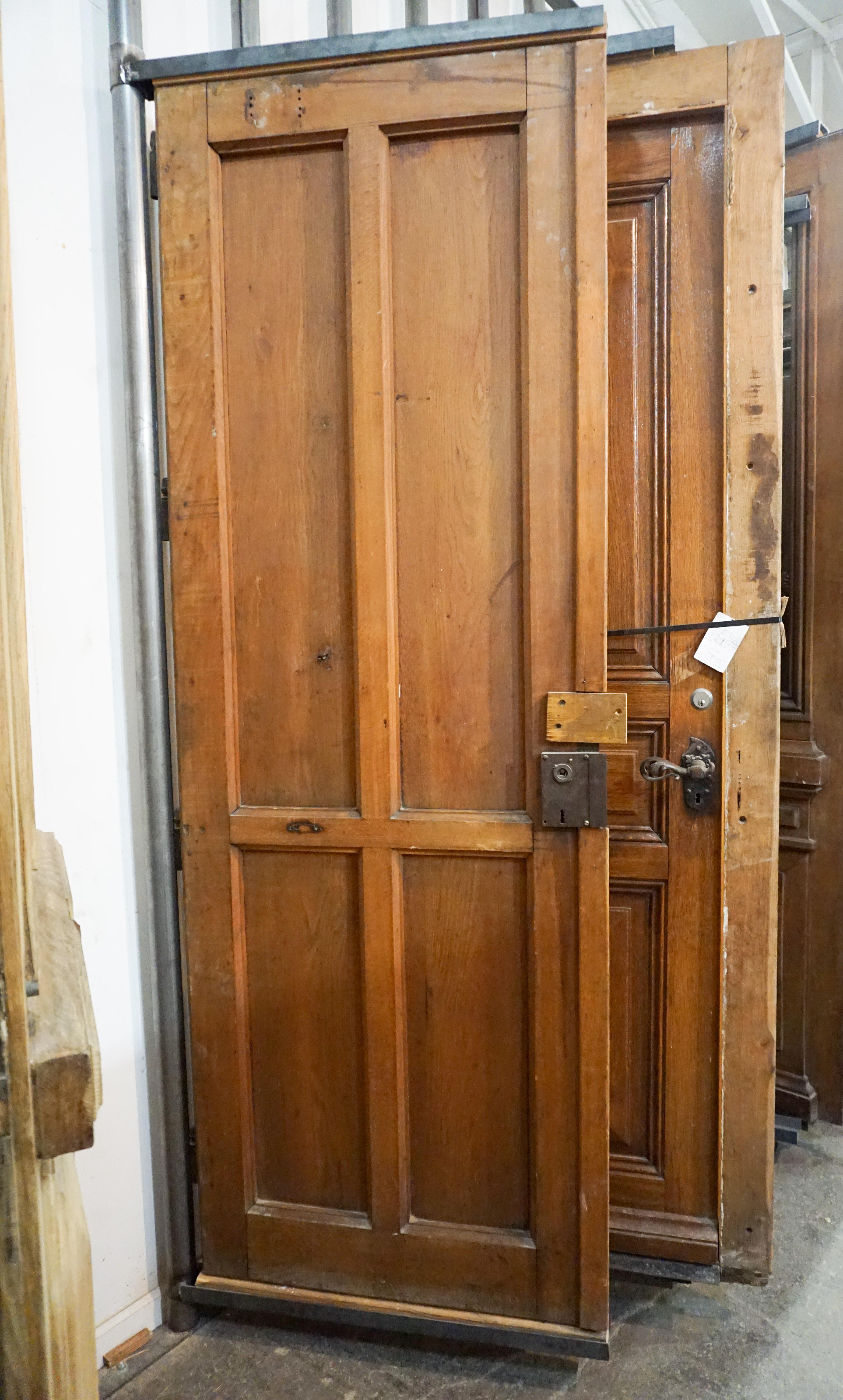 French double door set. Picture shows only one but we have both in stock. Features four rectangular panels.

Origin: France, circa 1850

Measurements: 66 3/4