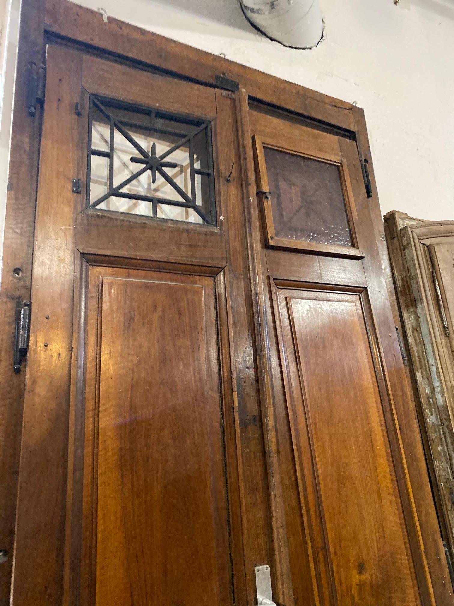 french doors with transom above