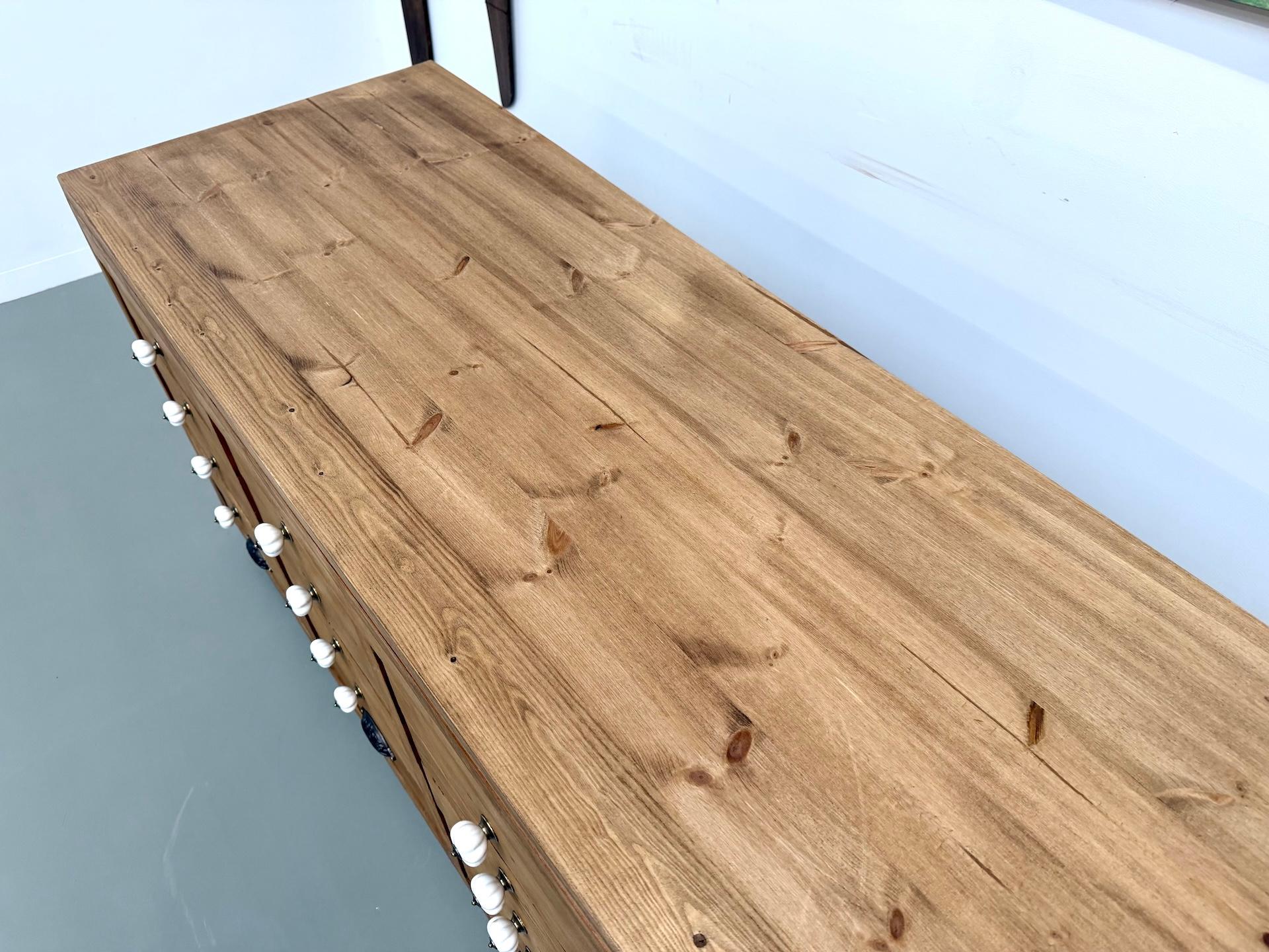 Mid-20th Century French double-sided shop counter in solid pine and oak, 1960s. For Sale