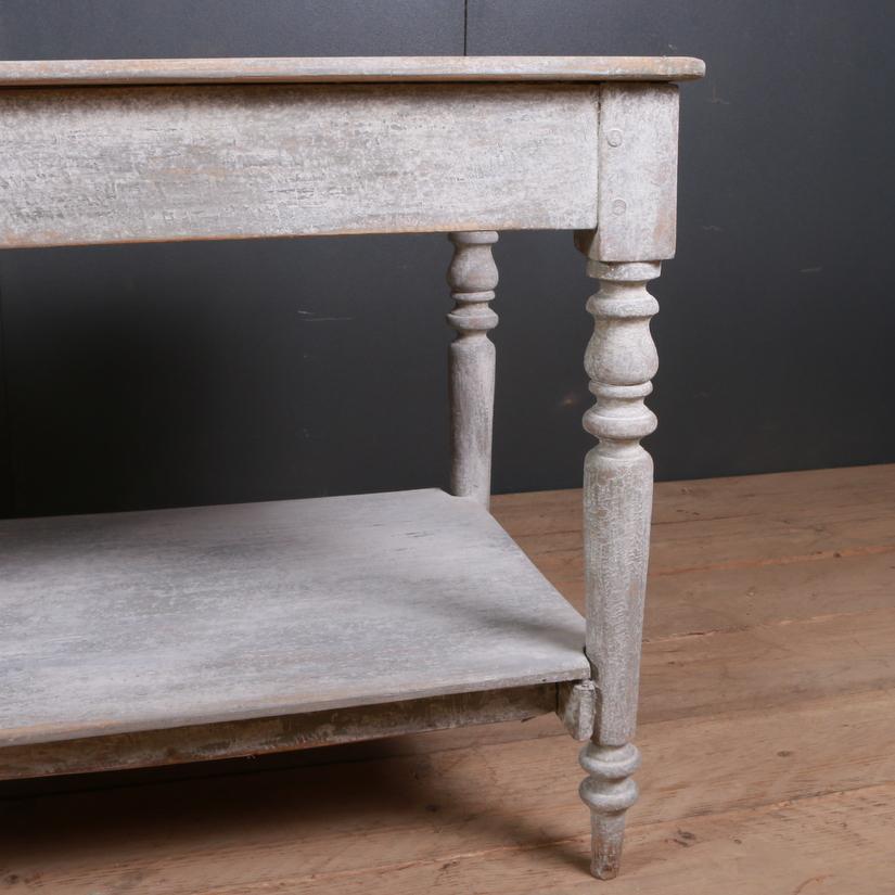 Small 19th century French painted pine drapers table with old grey paint, 1860

Dimensions
70 inches (178 cms) wide
24 inches (61 cms) deep
29.5 inches (75 cms) high.

    
