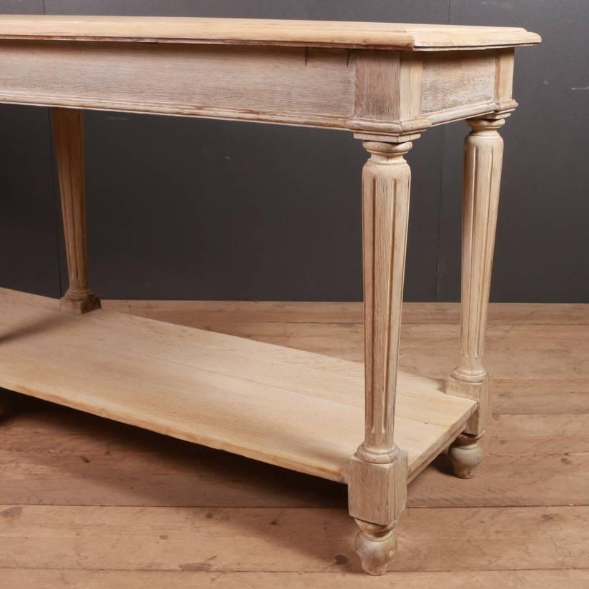 19th century French bleached oak drapers table, 1890

Dimensions
88.5 inches (225 cms) wide
22 inches (56 cms) deep
36 inches (91 cms) high.

 
