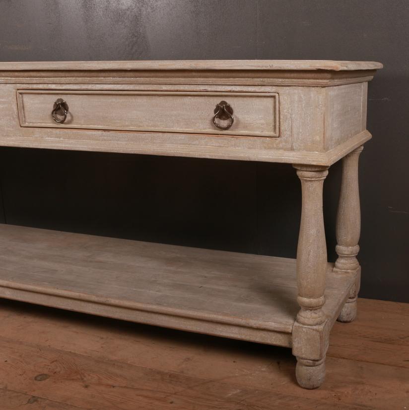 19th century French 3-drawer painted drapers table, 1890

Dimensions:
95 inches (241 cms) wide
22 inches (56 cms) deep
32.5 inches (83 cms) high.

 