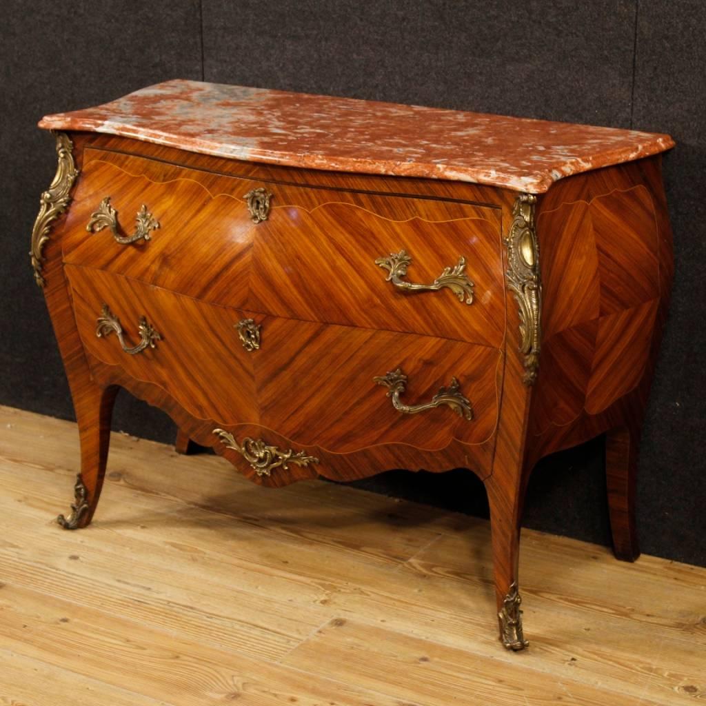 French dresser from the mid-20th century. Furniture in Louis XV style of beautiful line and fabulous decor. Chest of drawers inlaid in rosewood, palisander and maple with two frontal drawers of good capacity and service. Top in original marble in