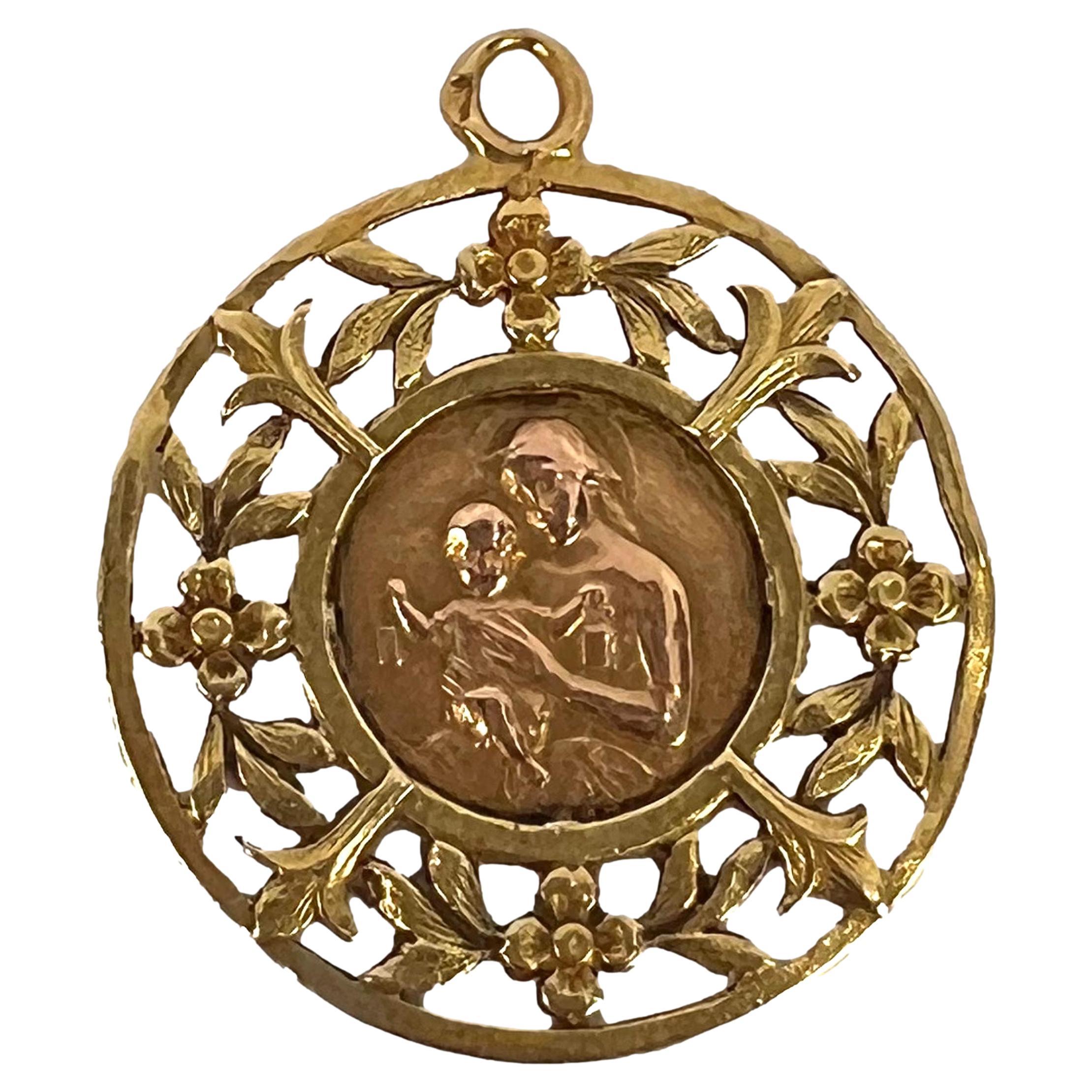 Pendentif en or jaune rose 18 carats représentant la Vierge et l'Enfant de Dropsy français 