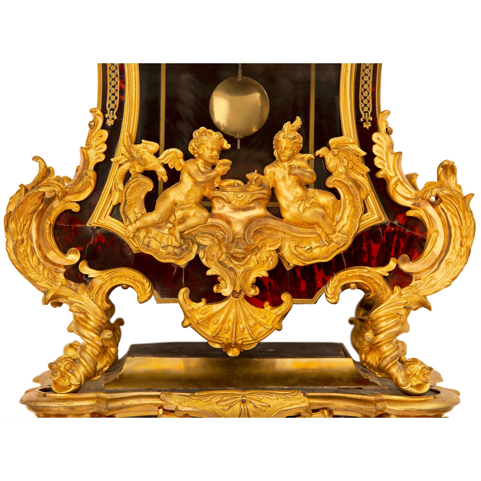 French Early 18th Century Louis XV Period Tortoise Shell and Ormolu Cartel Clock For Sale 2