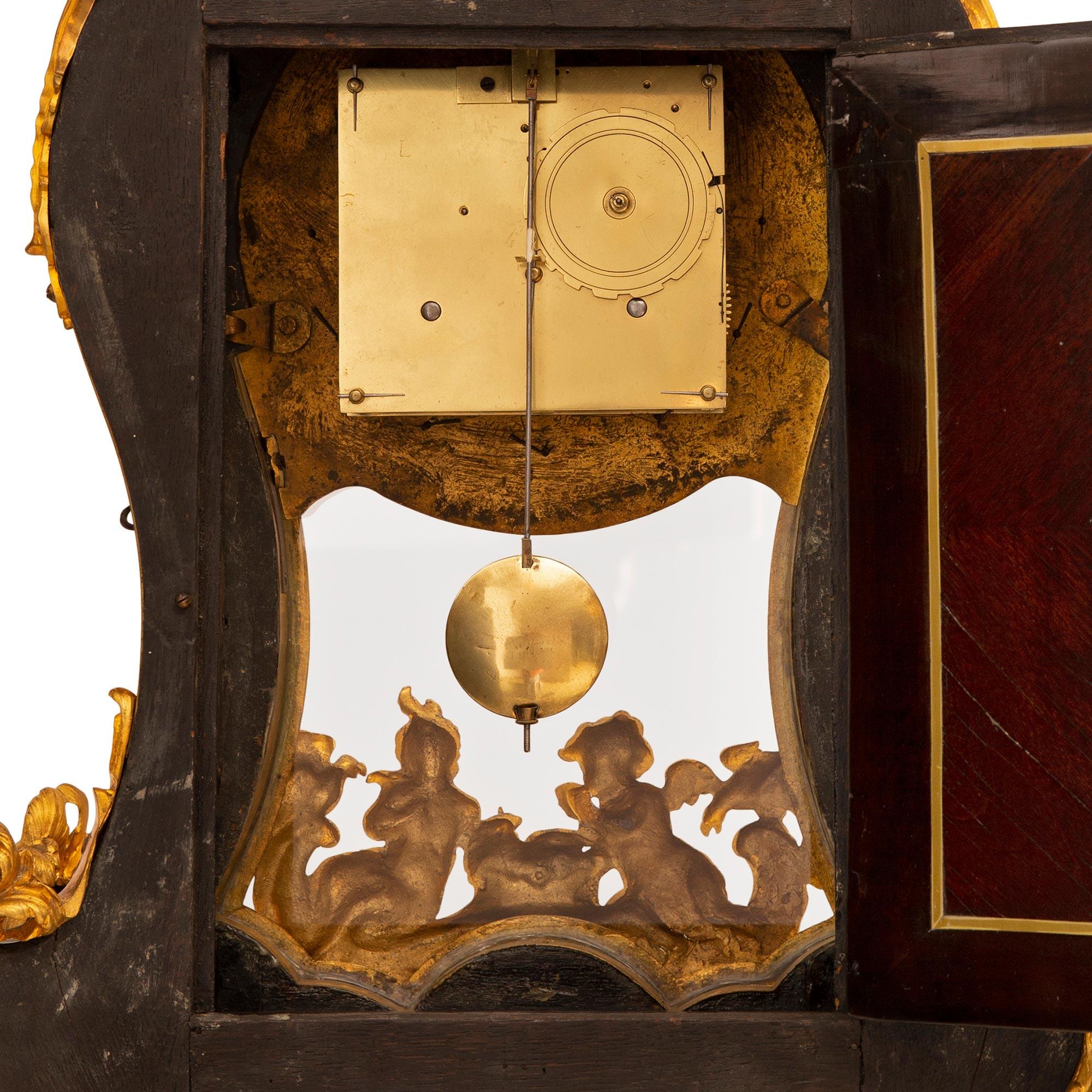 French Early 18th Century Louis XV Period Tortoise Shell and Ormolu Cartel Clock For Sale 4