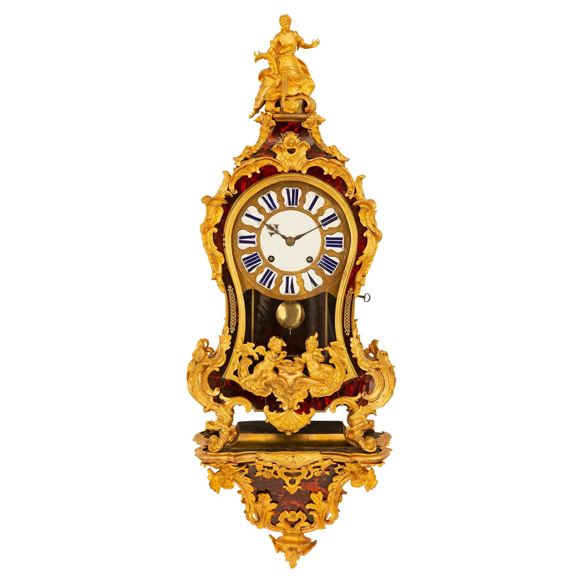 French Early 18th Century Louis XV Period Tortoise Shell and Ormolu Cartel Clock For Sale