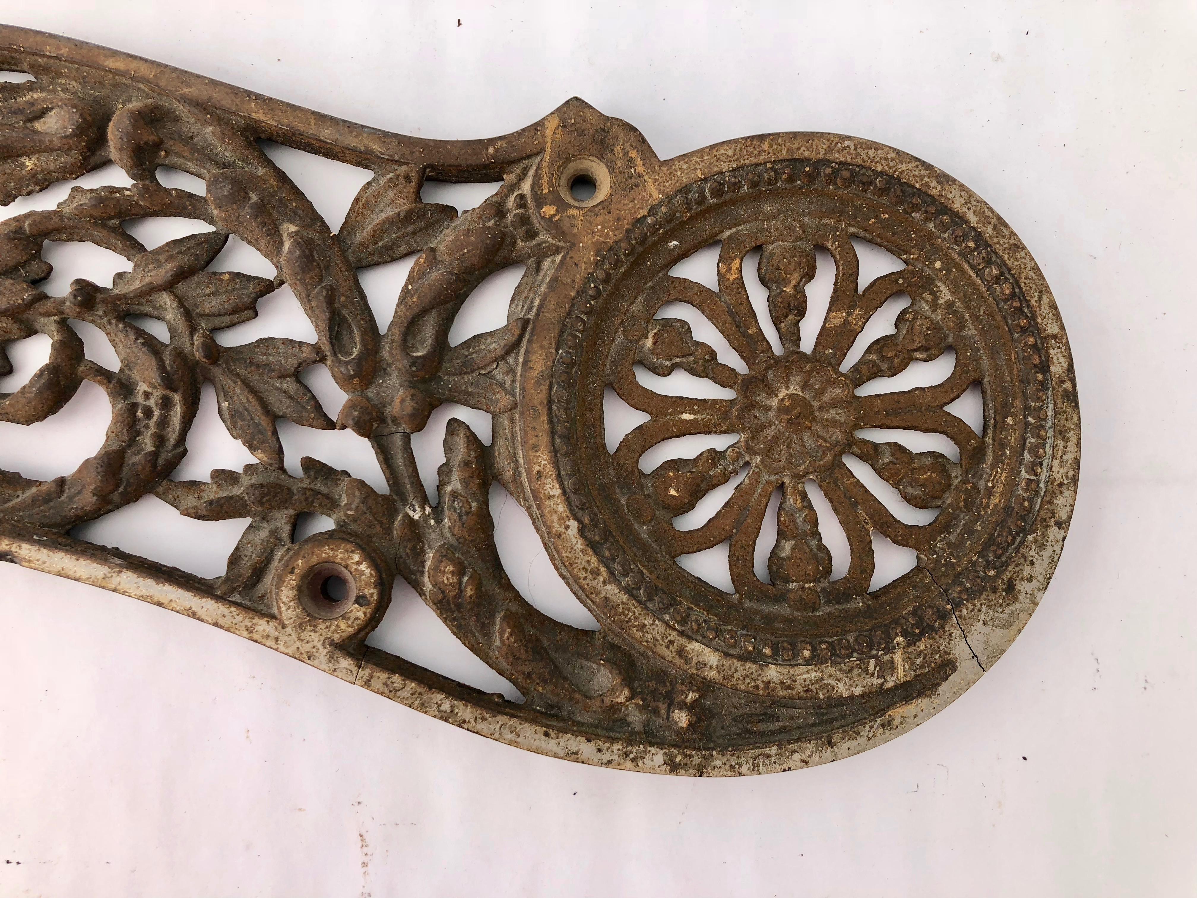 This early 1900s cast iron decorative piece could be used in a number of ways to add an French touch.