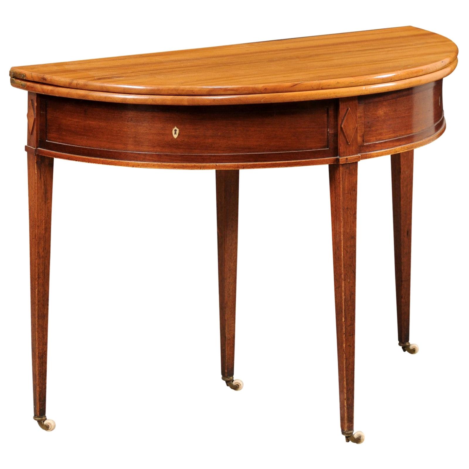 Table française du début du XIXe siècle, demi-lune à ronde avec pieds de porte et petites pieds en fonte en vente