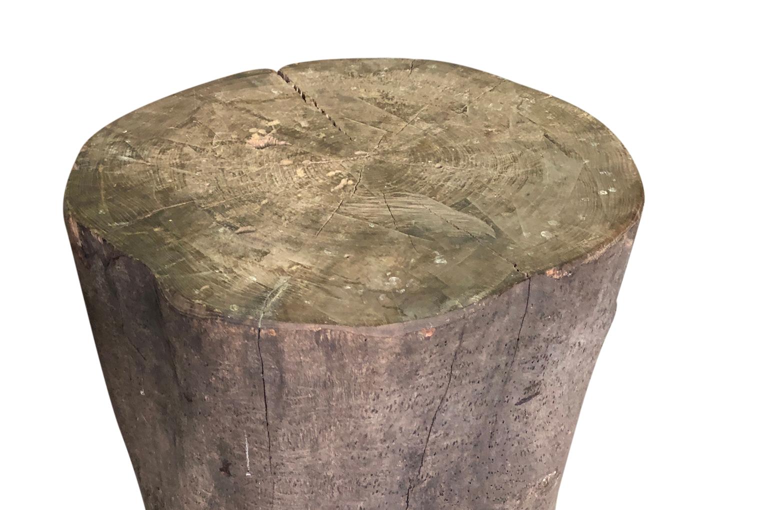 A terrific Primitive early 19th century Billot - Chopping block from the Ardeche region of France. A wonderful end table for any casual interior or exterior living area.