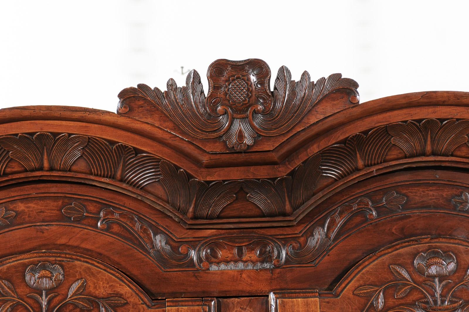 French Early 19th Century Cherry Armoire from Rennes Brittany with Carved Motifs In Good Condition In Atlanta, GA