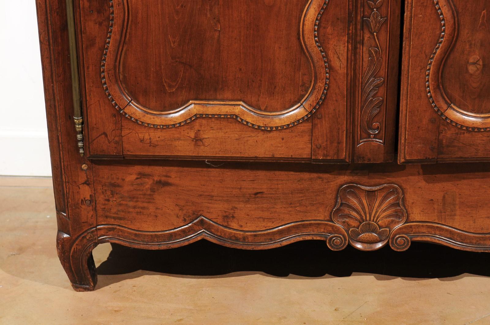 French Early 19th Century Cherry Armoire from Rennes Brittany with Carved Motifs 1