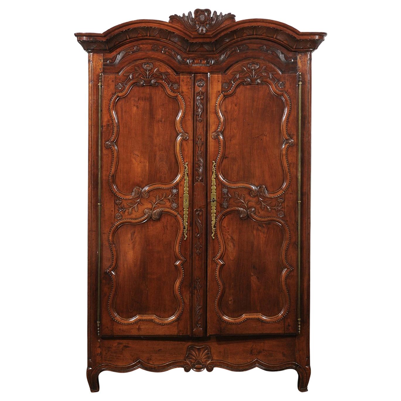 French Early 19th Century Cherry Armoire from Rennes Brittany with Carved Motifs