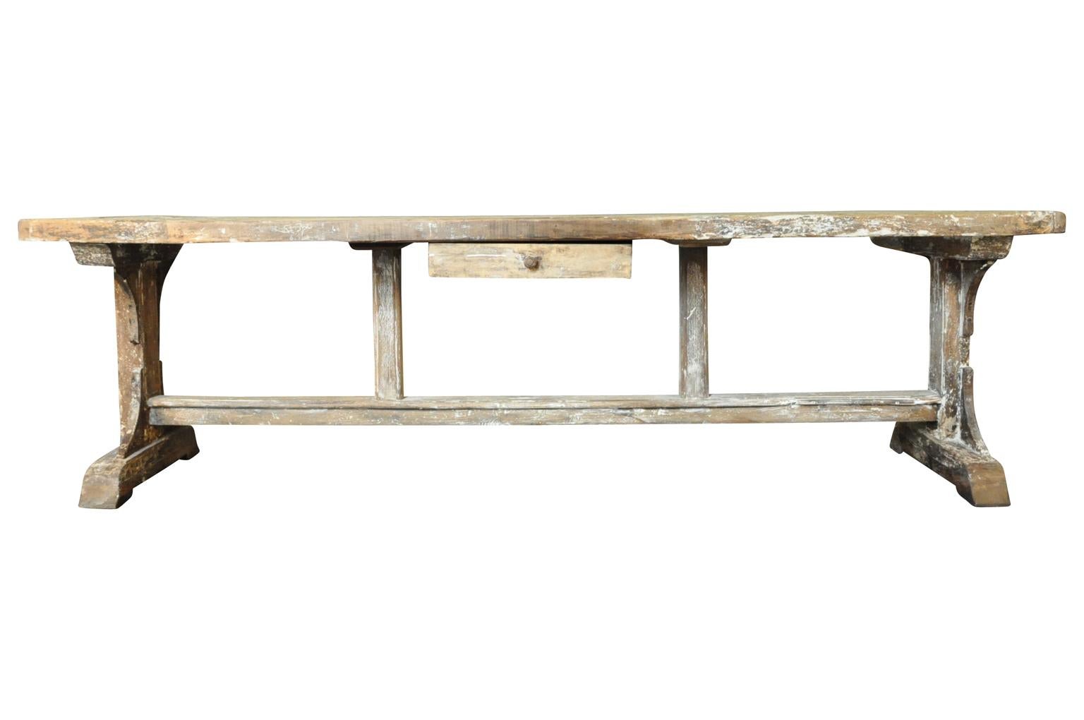 A very handsome early 19th century console table from the Provence region of France.  Soundly constructed from scraped beech wood with a single drawer.  Perfect as a long console table or as a sofa table.