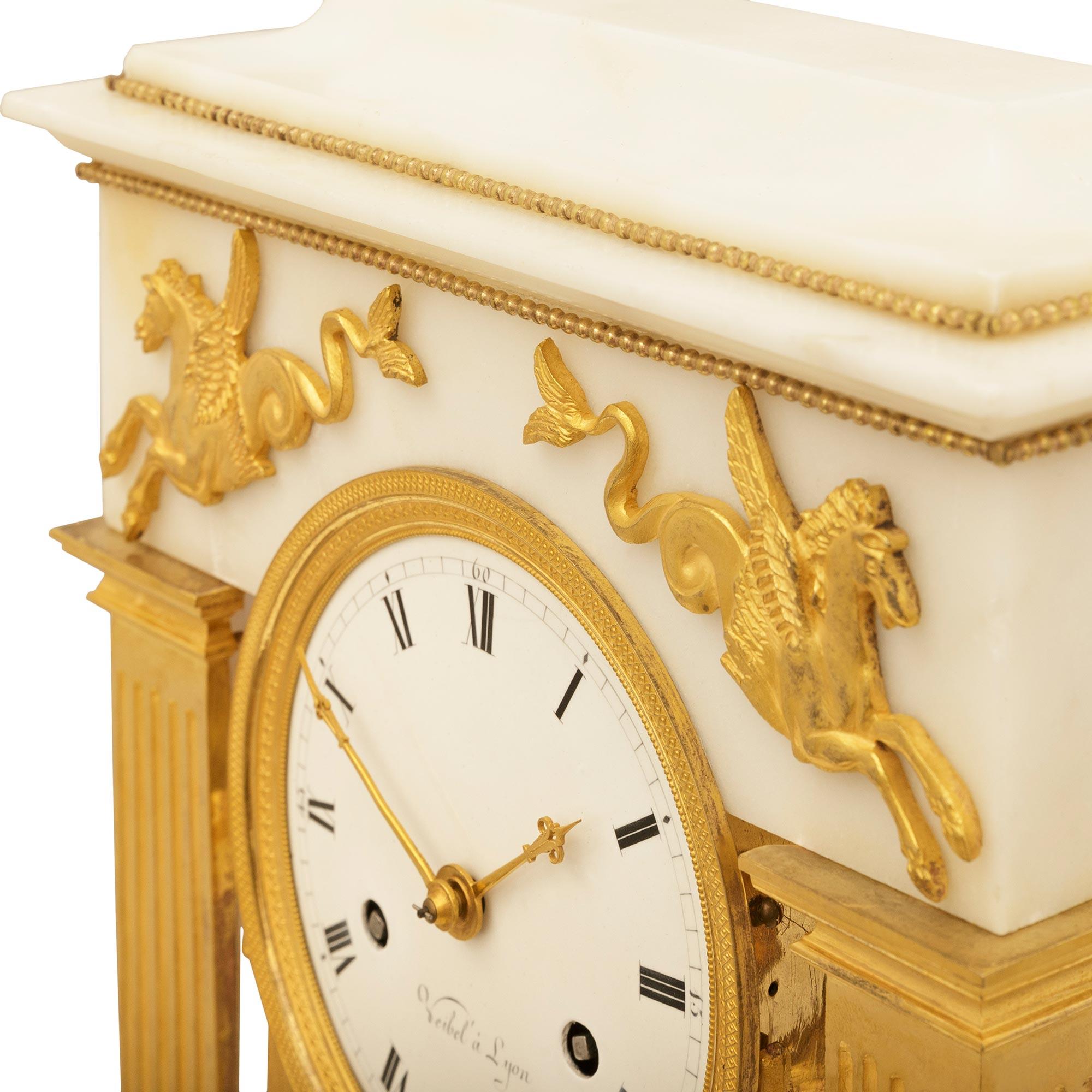French early 19th century Empire st. white Carrara marble and Ormolu clock For Sale 1
