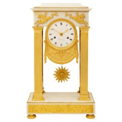 French early 19th century Empire st. white Carrara marble and Ormolu clock