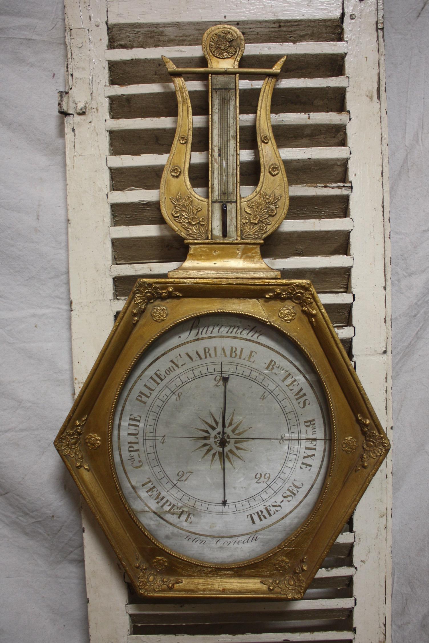 French early 19th century gilt barometer.