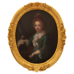 Portrait d'une jeune fille en bois doré et huile sur toile du début du XIXe siècle