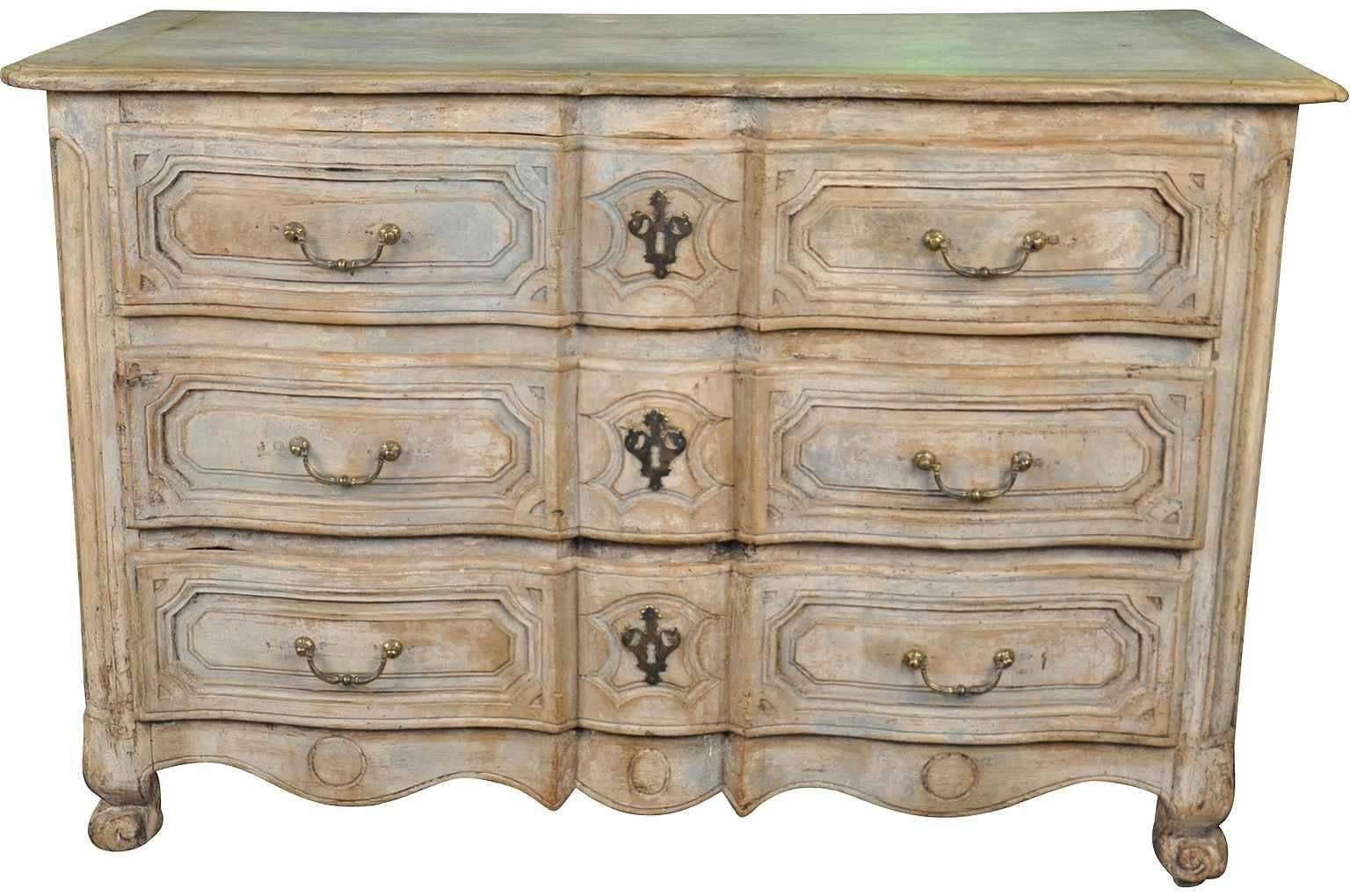 A very lovely early 19th century French Louis XIII style commode from the South of France. Beautifully constructed from walnut in the Arbalette shape. Very sound. Outstanding hardware. Wonderful painted finish and patina. Not only perfect as a