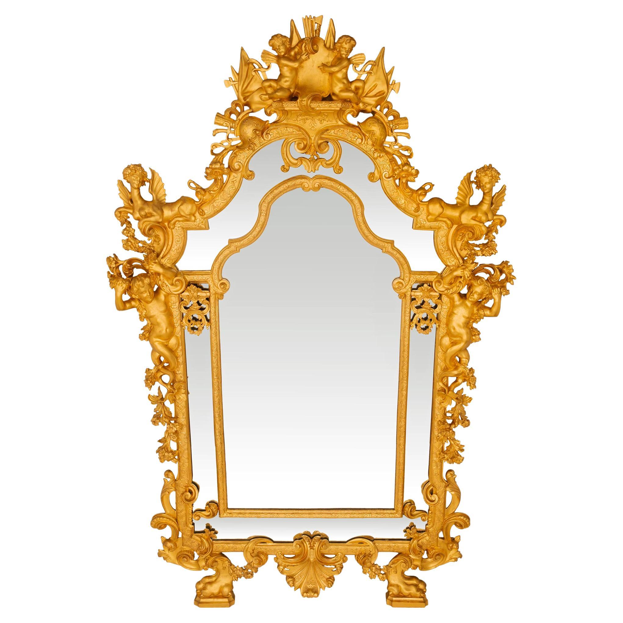 Miroir en bois doré de style Louis XIV du début du XIXe siècle